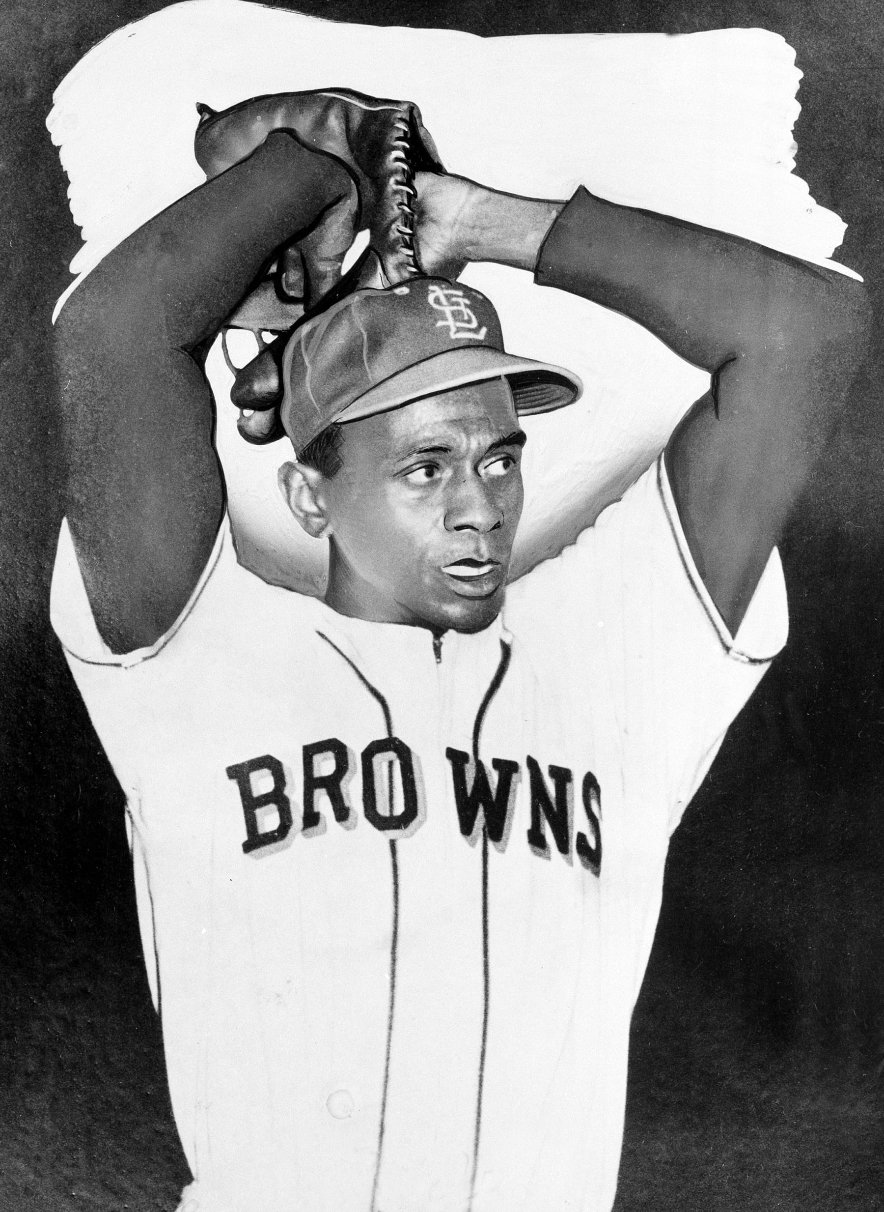 Satchel Paige, the ageless right-handed pitching star, returns to major league baseball starting for the Browns in St. Louis, on July 19, 1951. Here he is seen warming up prior to a game against the Washington Senators. (AP Photo)