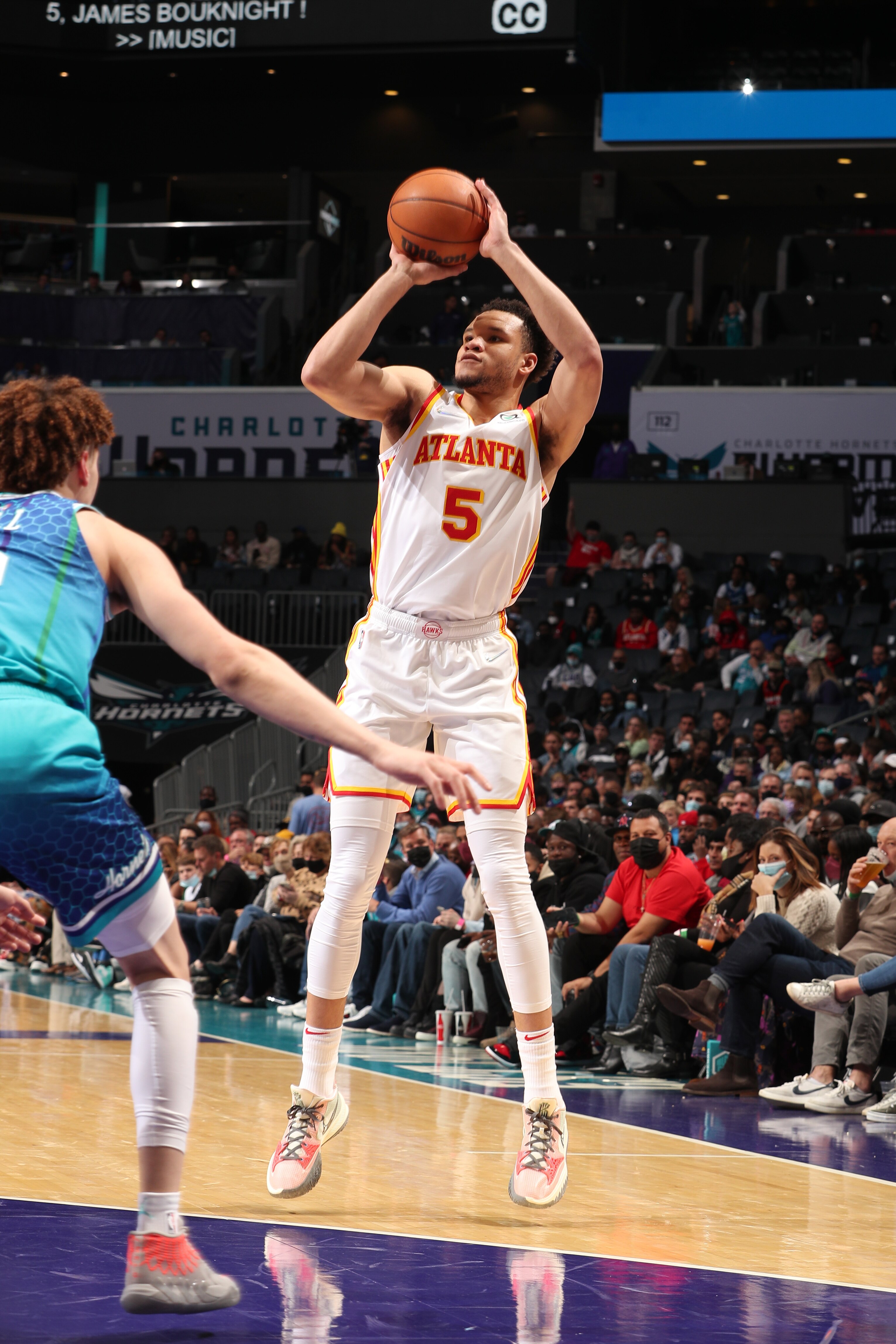 CHARLOTTE, NC - JANUARY 23: Kevin Knox II #5 of the Atlanta Hawks shoots the ball during the game against the Charlotte Hornets on January 23, 2022 at Spectrum Center in Charlotte, North Carolina. NOTE TO USER: User expressly acknowledges and agrees that, by downloading and or using this photograph, User is consenting to the terms and conditions of the Getty Images License Agreement. Mandatory Copyright Notice: Copyright 2022 NBAE (Photo by Kent Smith/NBAE via Getty Images)