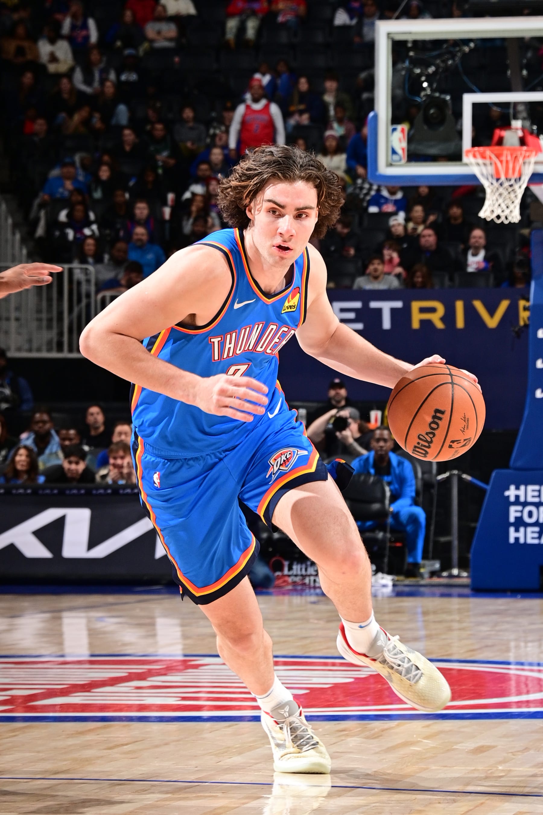 DETROIT, MI - JANUARY 28: Josh Giddey #3 of the Oklahoma City Thunder handles the ball during the game against the Detroit Pistons on January 28, 2024 at Little Caesars Arena in Detroit, Michigan. NOTE TO USER: User expressly acknowledges and agrees that, by downloading and/or using this photograph, User is consenting to the terms and conditions of the Getty Images License Agreement. Mandatory Copyright Notice: Copyright 2024 NBAE (Photo by Chris Schwegler/NBAE via Getty Images)