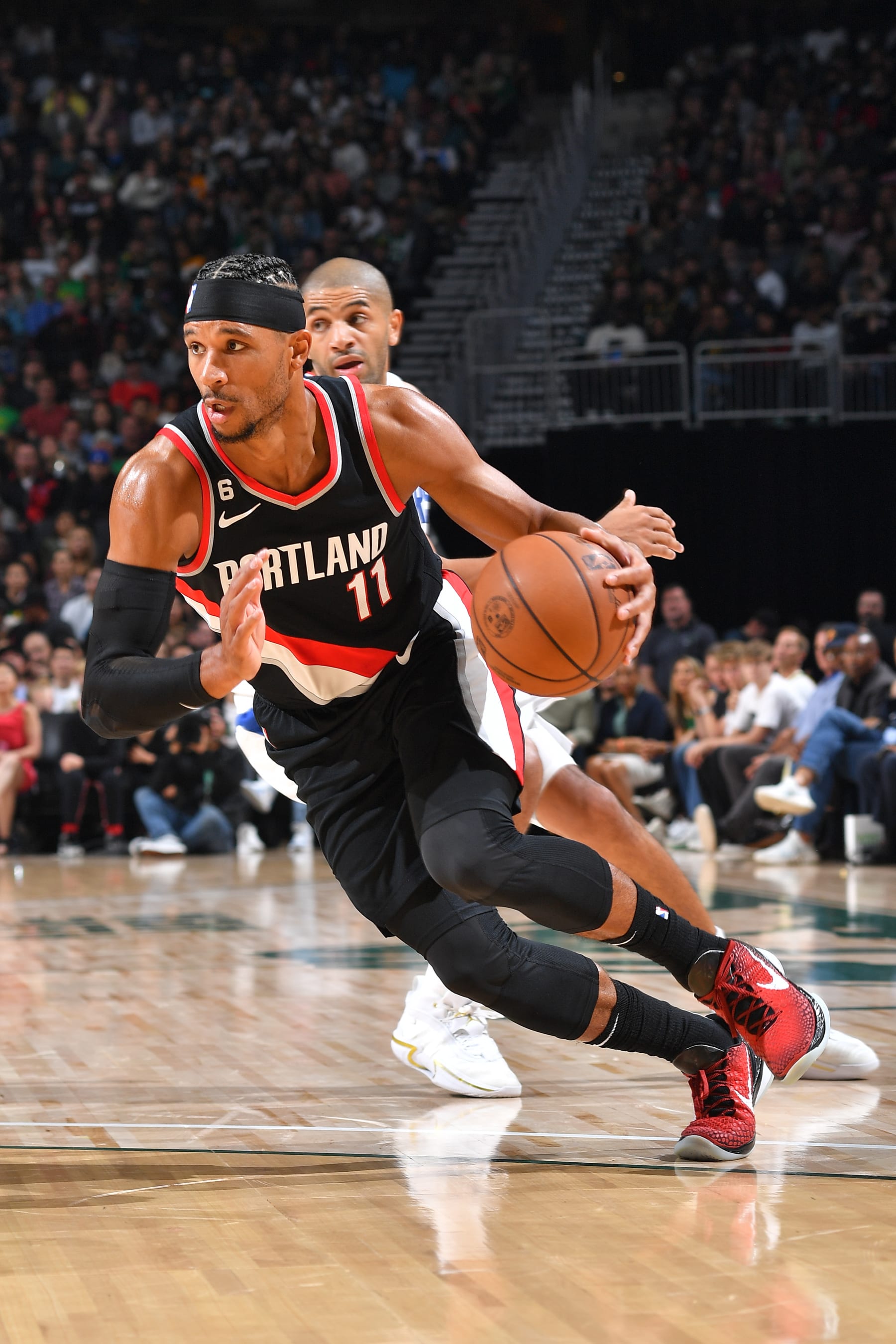 SEATTLE, WA - OCTOBER 3: Josh Hart #11 of the Portland Trail Blazers drives to the basket against the LA Clippers during a preseason game on October 3, 2022 at the Climate Pledge Arena in Seattle, Washington. NOTE TO USER: User expressly acknowledges and agrees that, by downloading and or using this photograph, user is consenting to the terms and conditions of the Getty Images License Agreement. Mandatory Copyright Notice: Copyright 2022 NBAE (Photos by Michael Gonzales/NBAE via Getty Images)