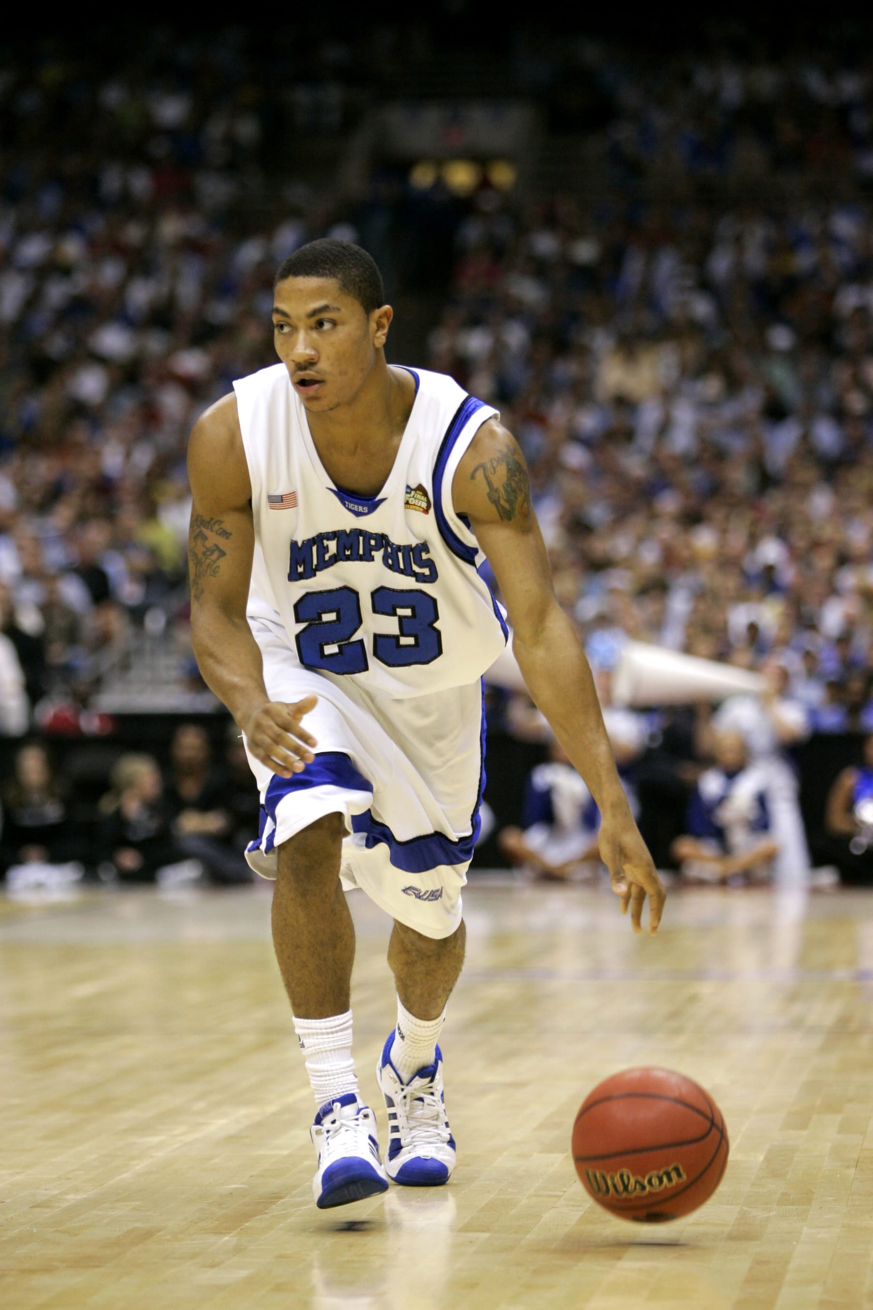 Memphis' Derrick Rose #23 recovers the ball during the championship game at the NCAA college basketball Final Four Monday, April 7, 2008, in San Antonio. (AP Photo/Eric Gay)