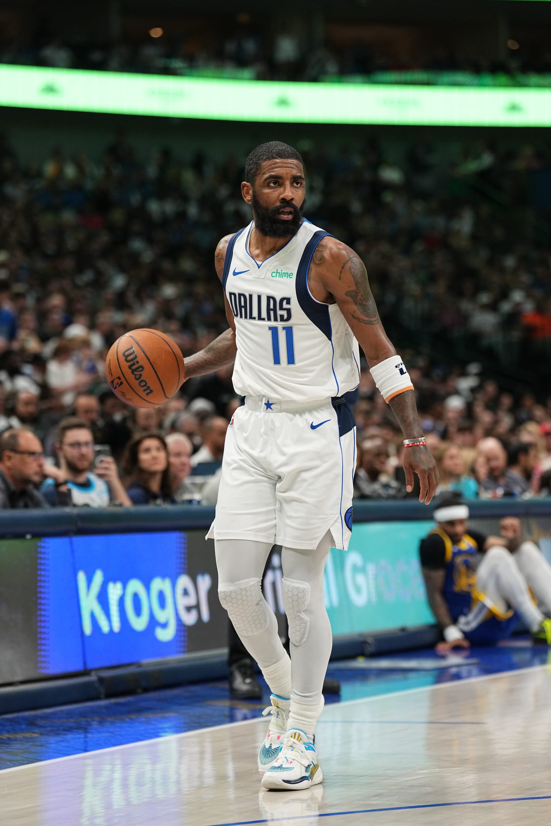 DALLAS, TX - MARCH 13: Kyrie Irving #11 of the Dallas Mavericks dribbles the ball during the game against the Golden State Warriors on March 13, 2024 at the American Airlines Center in Dallas, Texas. NOTE TO USER: User expressly acknowledges and agrees that, by downloading and or using this photograph, User is consenting to the terms and conditions of the Getty Images License Agreement. Mandatory Copyright Notice: Copyright 2024 NBAE (Photo by Glenn James/NBAE via Getty Images)