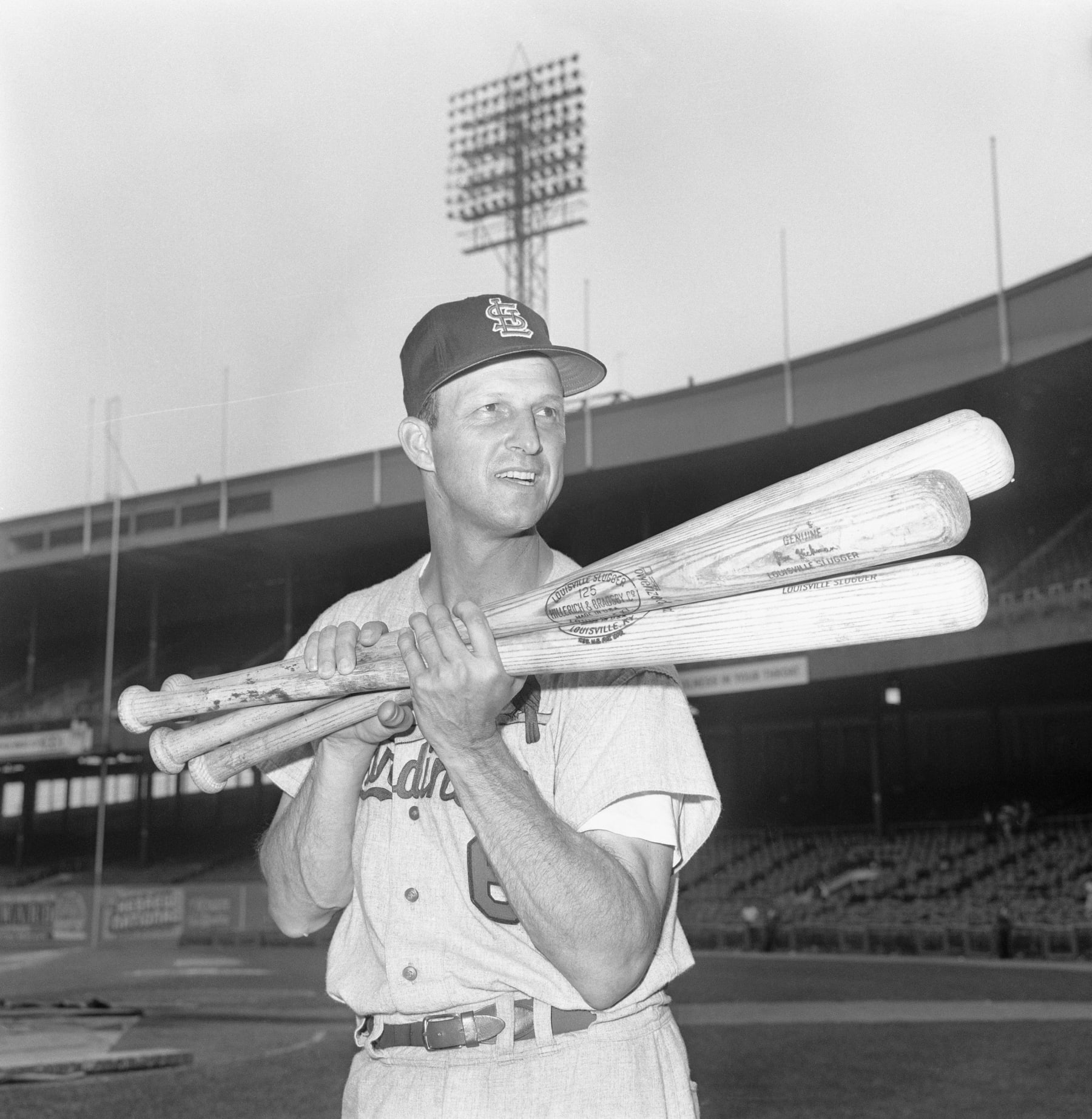 (Original Caption) That Man Stan. New York, New York: Stan Musial goes along with the gag and lifts four bats after belting four consecutive homers at the Polo Grounds. The man hit the last three as Cards beat Mets, 15-1.