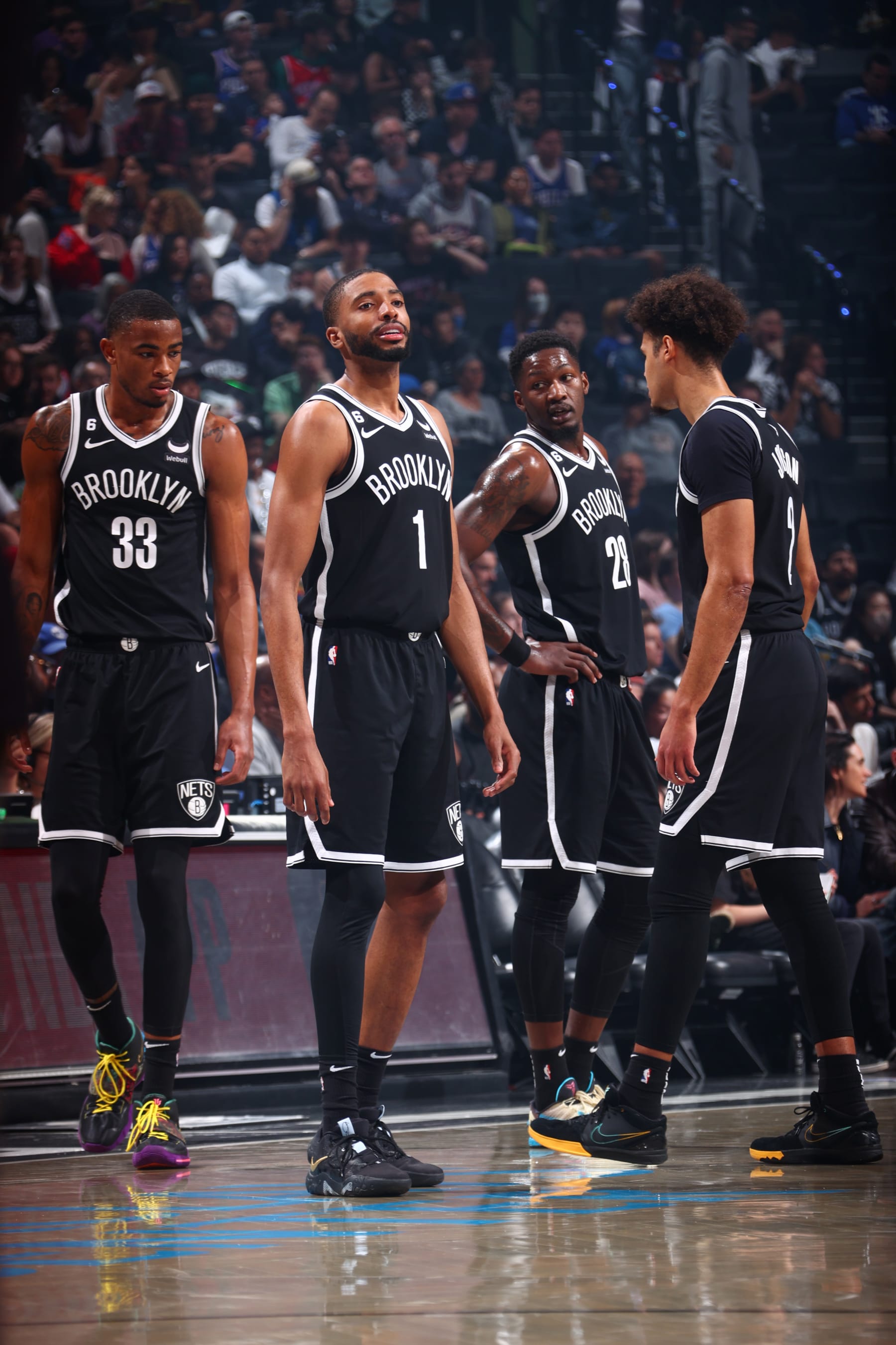 BROOKLYN, NY - APRIL 22: Nicolas Claxton #33, Mikal Bridges #1, Dorian Finney-Smith #28 and Cameron Johnson #2 of the Brooklyn Nets look on during the game against the Philadelphia 76ers during Round 1 Game 4 of the 2023 NBA Playoffs on April 22, 2023 at Barclays Center in Brooklyn, New York. NOTE TO USER: User expressly acknowledges and agrees that, by downloading and or using this Photograph, user is consenting to the terms and conditions of the Getty Images License Agreement. Mandatory Copyright Notice: Copyright 2023 NBAE (Photo by Nathaniel S. Butler/NBAE via Getty Images)