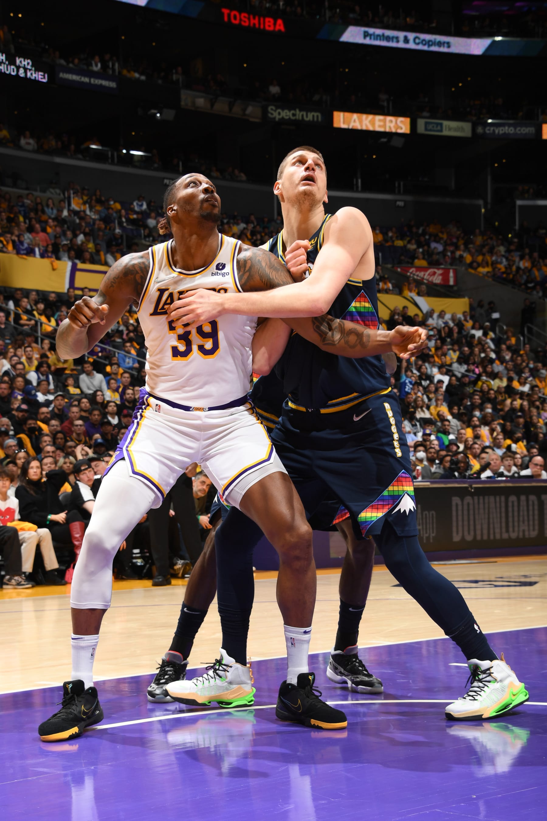 LOS ANGELES, CA - APRIL 3: Dwight Howard #39 of the Los Angeles Lakers plays defense on Nikola Jokic #15 of the Denver Nuggets during the game on April 3, 2022 at Crypto.Com Arena in Los Angeles, California. NOTE TO USER: User expressly acknowledges and agrees that, by downloading and/or using this Photograph, user is consenting to the terms and conditions of the Getty Images License Agreement. Mandatory Copyright Notice: Copyright 2022 NBAE (Photo by Andrew D. Bernstein/NBAE via Getty Images)
