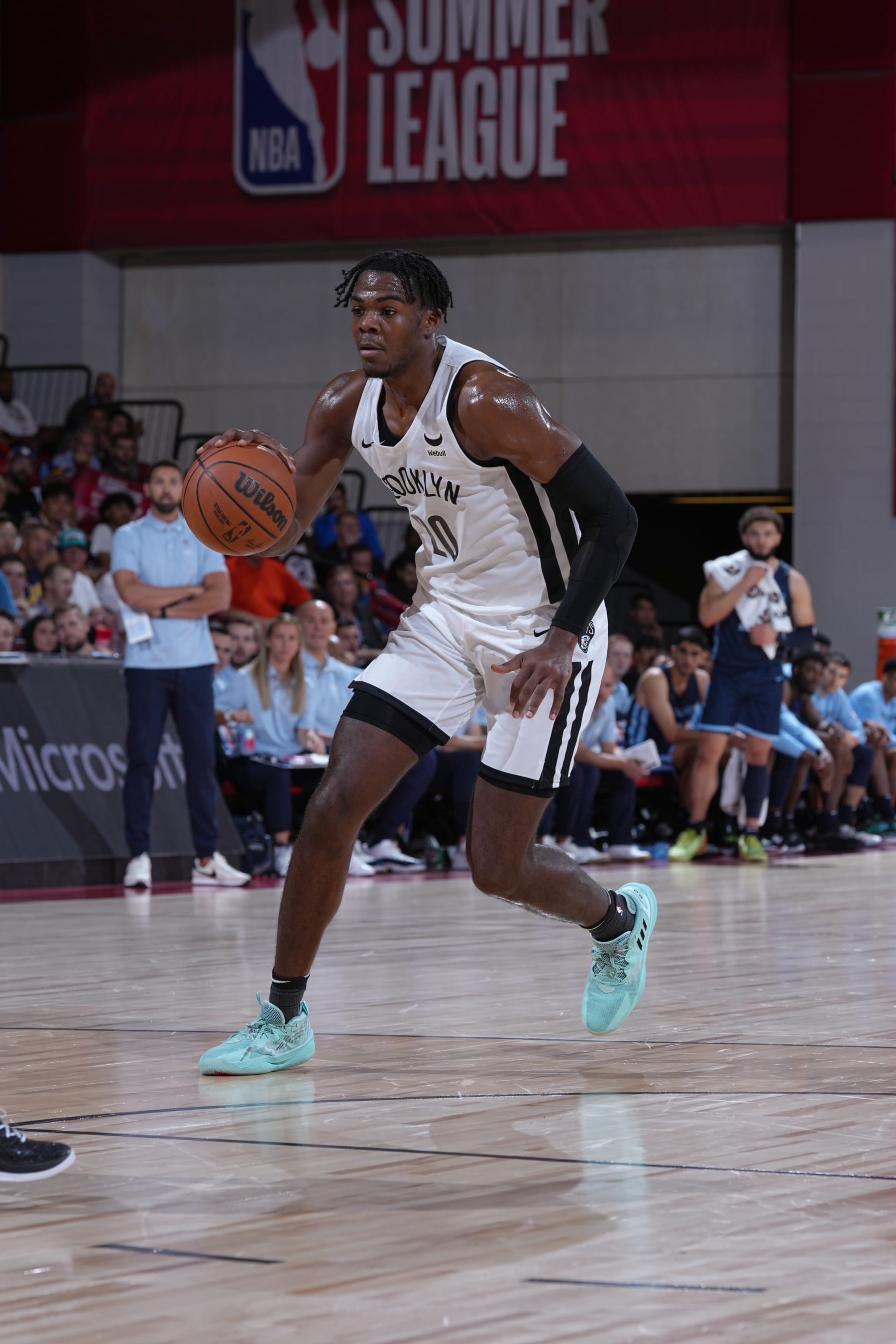 LAS VEGAS, NV - JULY 12: Day'Ron Sharpe #20 of the Brooklyn Nets dribbles the ball against the Memphis Grizzlies during the 2022 Las Vegas Summer League on July 12, 2022 at the Cox Pavilion in Las Vegas, Nevada NOTE TO USER: User expressly acknowledges and agrees that, by downloading and/or using this Photograph, user is consenting to the terms and conditions of the Getty Images License Agreement. Mandatory Copyright Notice: Copyright 2022 NBAE (Photo by Jeff Bottari/NBAE via Getty Images)