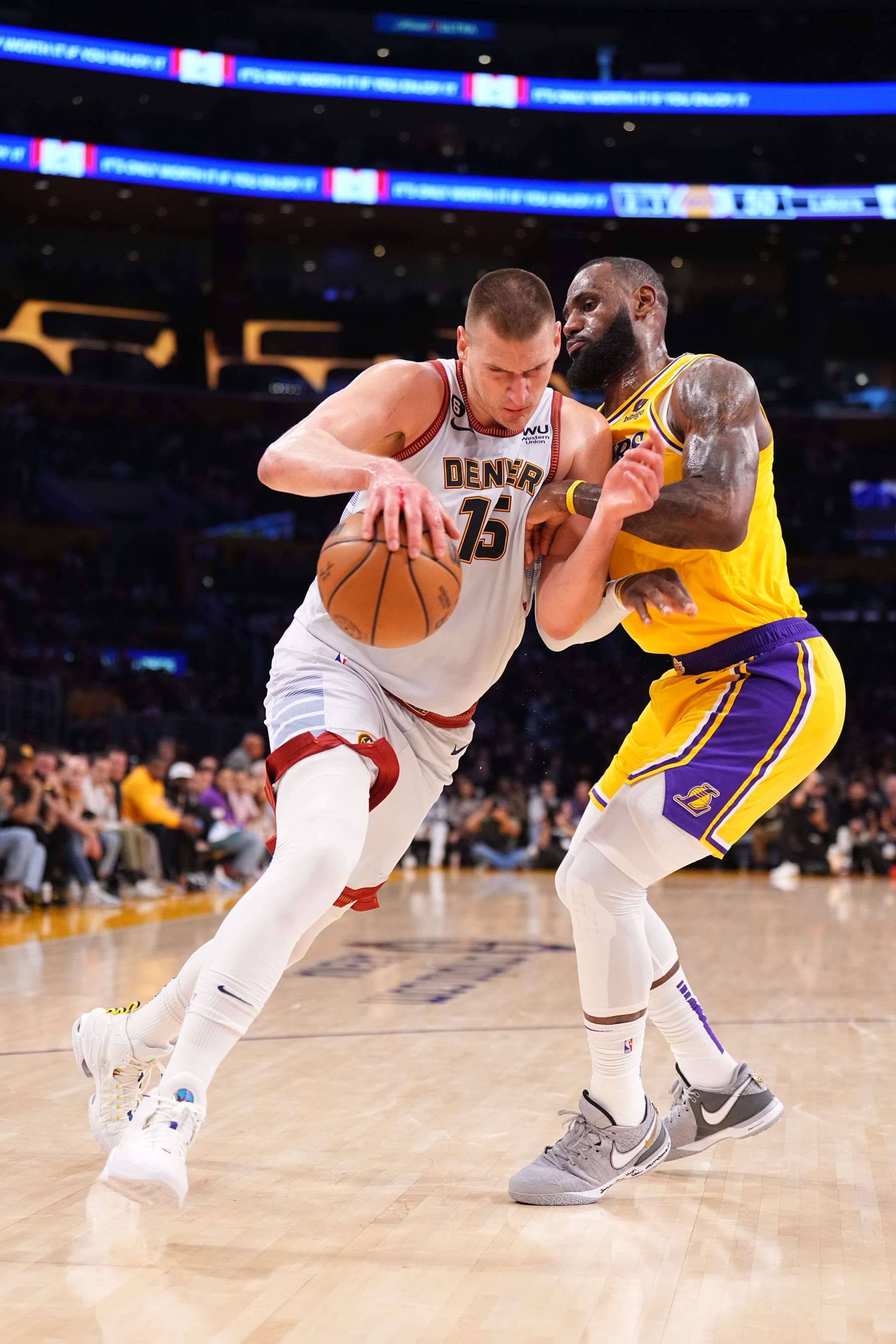 LOS ANGELES, CA - MAY 22: Nikola Jokic #15 of the Denver Nuggets drives to the basket during Game 4 of the 2023 NBA Playoffs Western Conference Finals against the Los Angeles Lakers on May 22, 2023 at Crypto.com Arena in Los Angeles, California. NOTE TO USER: User expressly acknowledges and agrees that, by downloading and/or using this Photograph, user is consenting to the terms and conditions of the Getty Images License Agreement. Mandatory Copyright Notice: Copyright 2023 NBAE (Photo by Garrett Ellwood/NBAE via Getty Images)