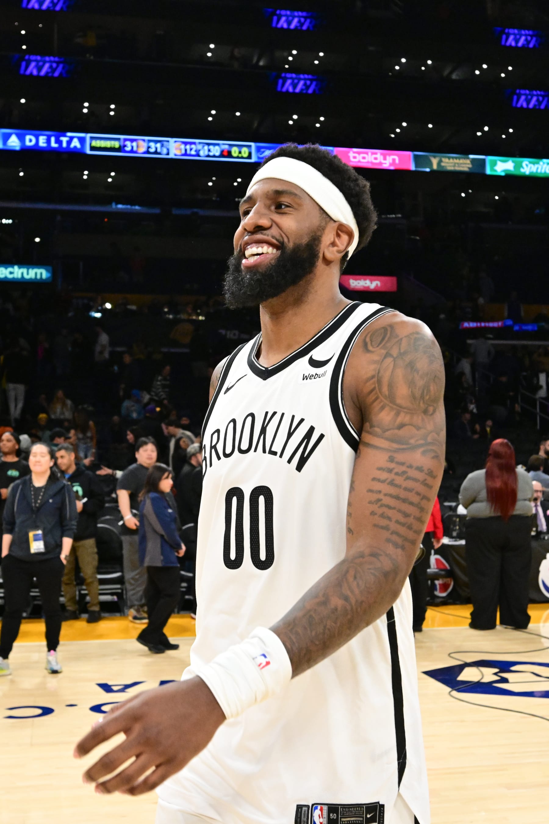 LOS ANGELES, CA - JANUARY 19:  Royce O'Neale #00 of the Brooklyn Nets look on after the game on January 19, 2024 at Crypto.Com Arena in Los Angeles, California. NOTE TO USER: User expressly acknowledges and agrees that, by downloading and/or using this Photograph, user is consenting to the terms and conditions of the Getty Images License Agreement. Mandatory Copyright Notice: Copyright 2024 NBAE (Photo by Adam Pantozzi/NBAE via Getty Images)