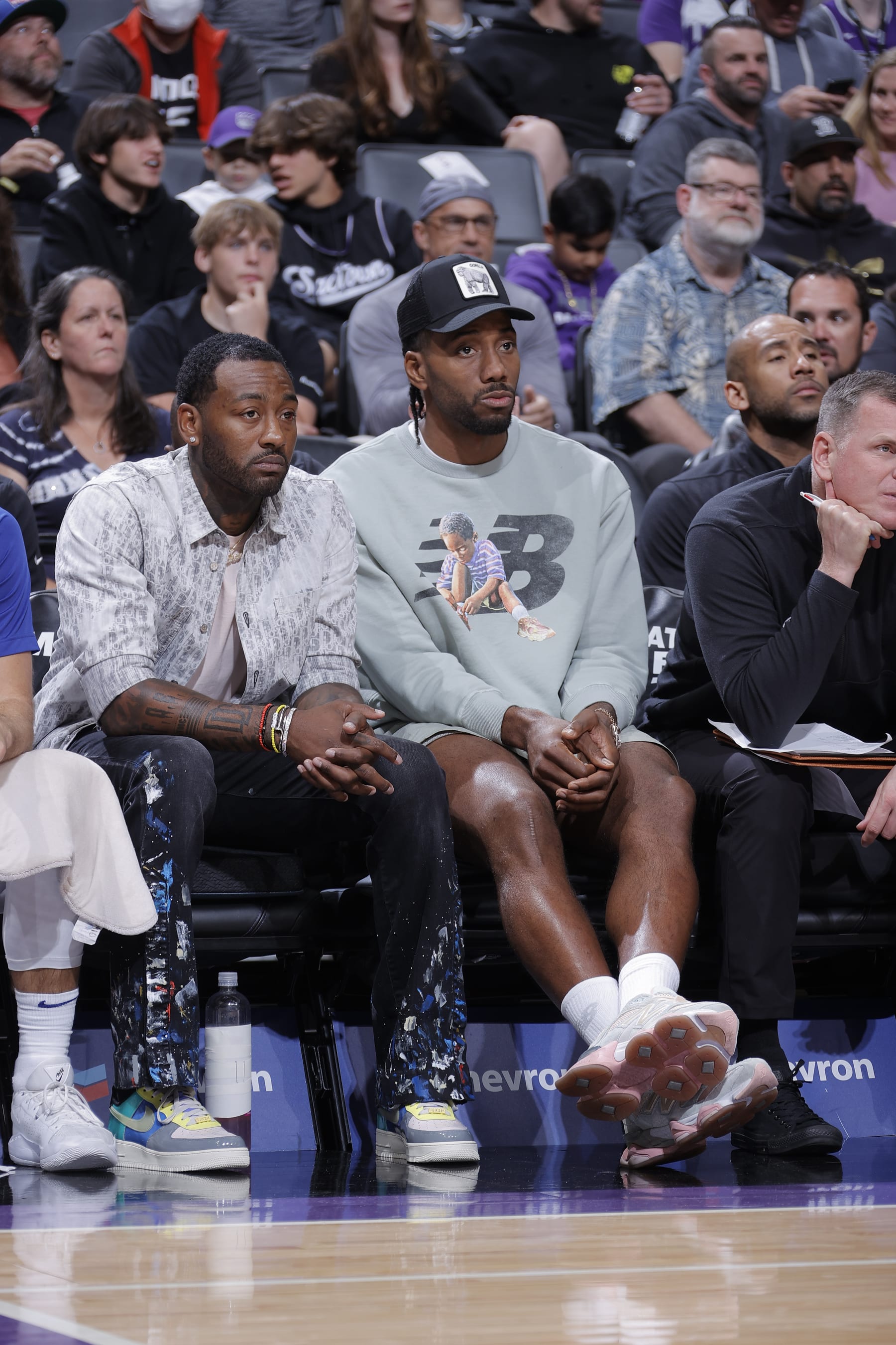 SACRAMENTO, CA - OCTOBER 22: John Wall #11 and Kawhi Leonard #2 of the Los Angeles Clippers looks on during the game against the Sacramento Kings on October 22, 2022 at Golden 1 Center in Sacramento, California. NOTE TO USER: User expressly acknowledges and agrees that, by downloading and or using this photograph, User is consenting to the terms and conditions of the Getty Images Agreement. Mandatory Copyright Notice: Copyright 2022 NBAE (Photo by Rocky Widner/NBAE via Getty Images)