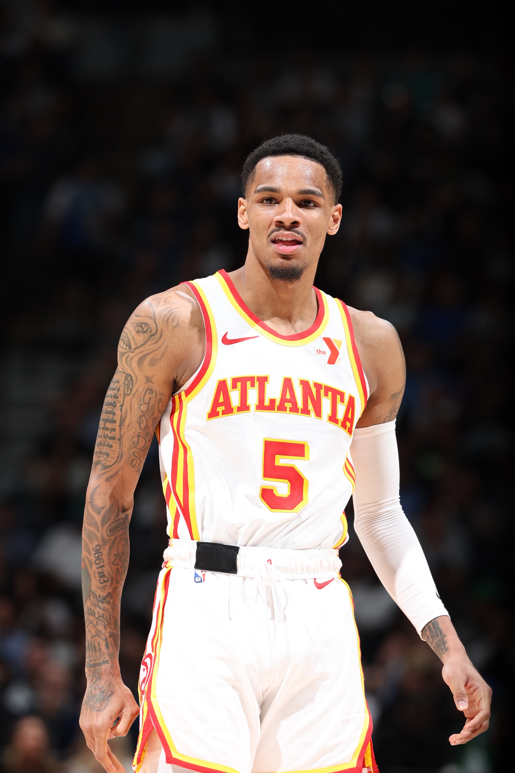 MINNEAPOLIS, MN -  APRIL 12: Dejounte Murray #5 of the Atlanta Hawks looks on during the game against the Minnesota Timberwolves on April 12, 2024 at Target Center in Minneapolis, Minnesota. NOTE TO USER: User expressly acknowledges and agrees that, by downloading and or using this Photograph, user is consenting to the terms and conditions of the Getty Images License Agreement. Mandatory Copyright Notice: Copyright 2024 NBAE (Photo by David Sherman/NBAE via Getty Images)