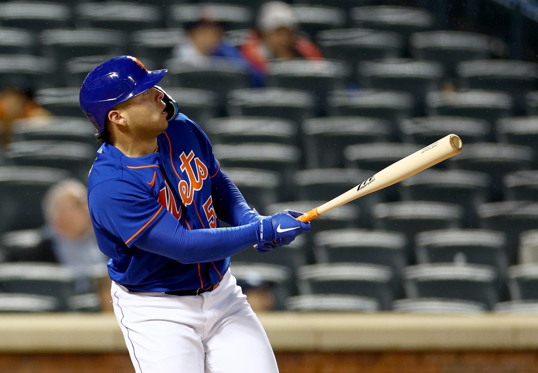 NEW YORK, NEW YORK - OCTOBER 04: Francisco Alvarez #50 of the New York Mets watches his solo home run in the sixth inning against the Washington Nationals during game two of a double header at Citi Field on October 04, 2022 in the Flushing neighborhood of the Queens borough of New York City. The New York Mets defeated the Washington Nationals 8-0. This is the first Major League home run and hit by Alvarez.  (Photo by Elsa/Getty Images)
