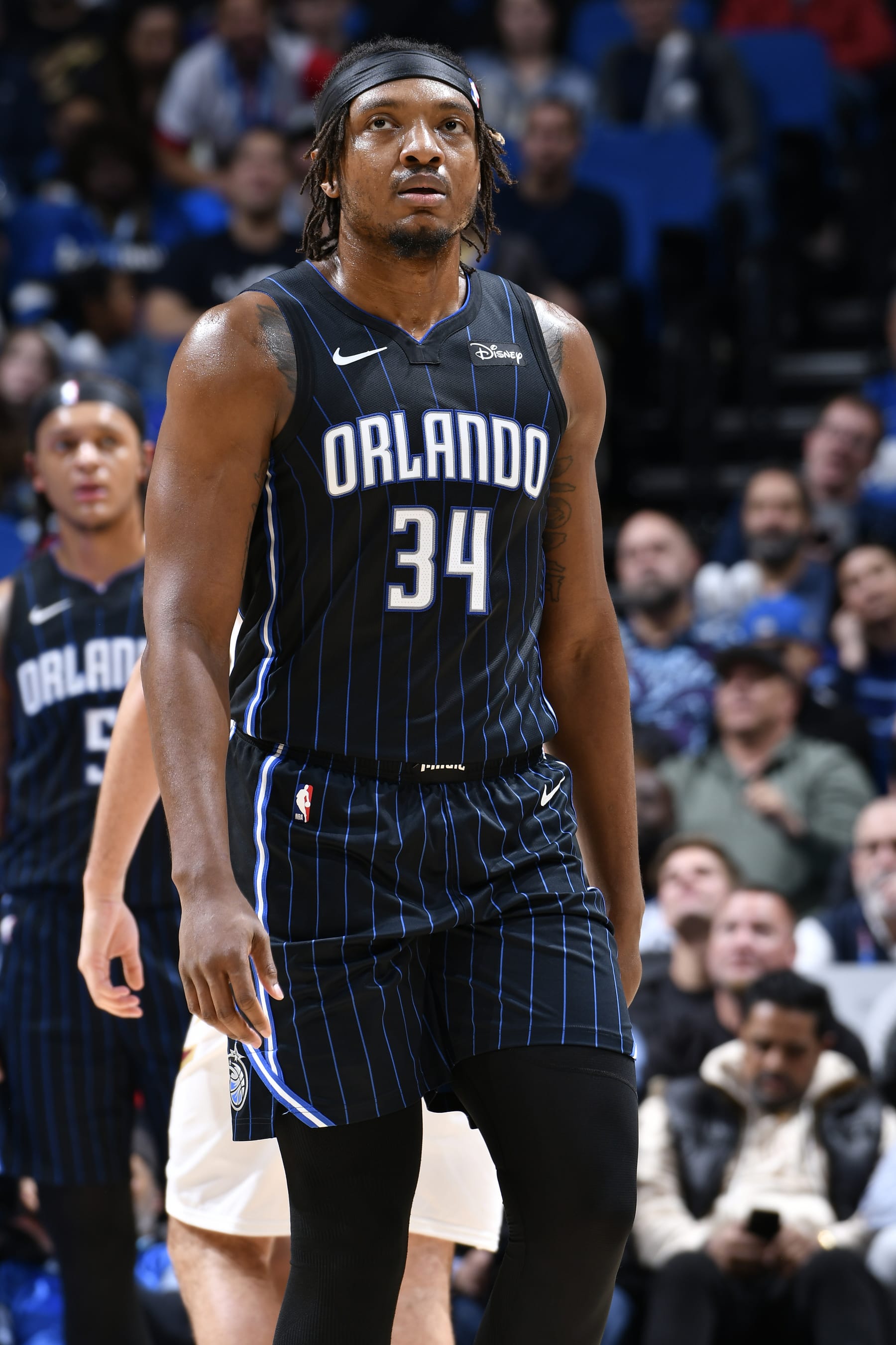 ORLANDO, FL - JANUARY 22: Wendell Carter Jr. #34 of the Orlando Magic looks on during the game against the Cleveland Cavaliers on January 22, 2024 at Kia Center in Orlando, Florida. NOTE TO USER: User expressly acknowledges and agrees that, by downloading and or using this photograph, User is consenting to the terms and conditions of the Getty Images License Agreement. Mandatory Copyright Notice: Copyright 2024 NBAE (Photo by Fernando Medina/NBAE via Getty Images)