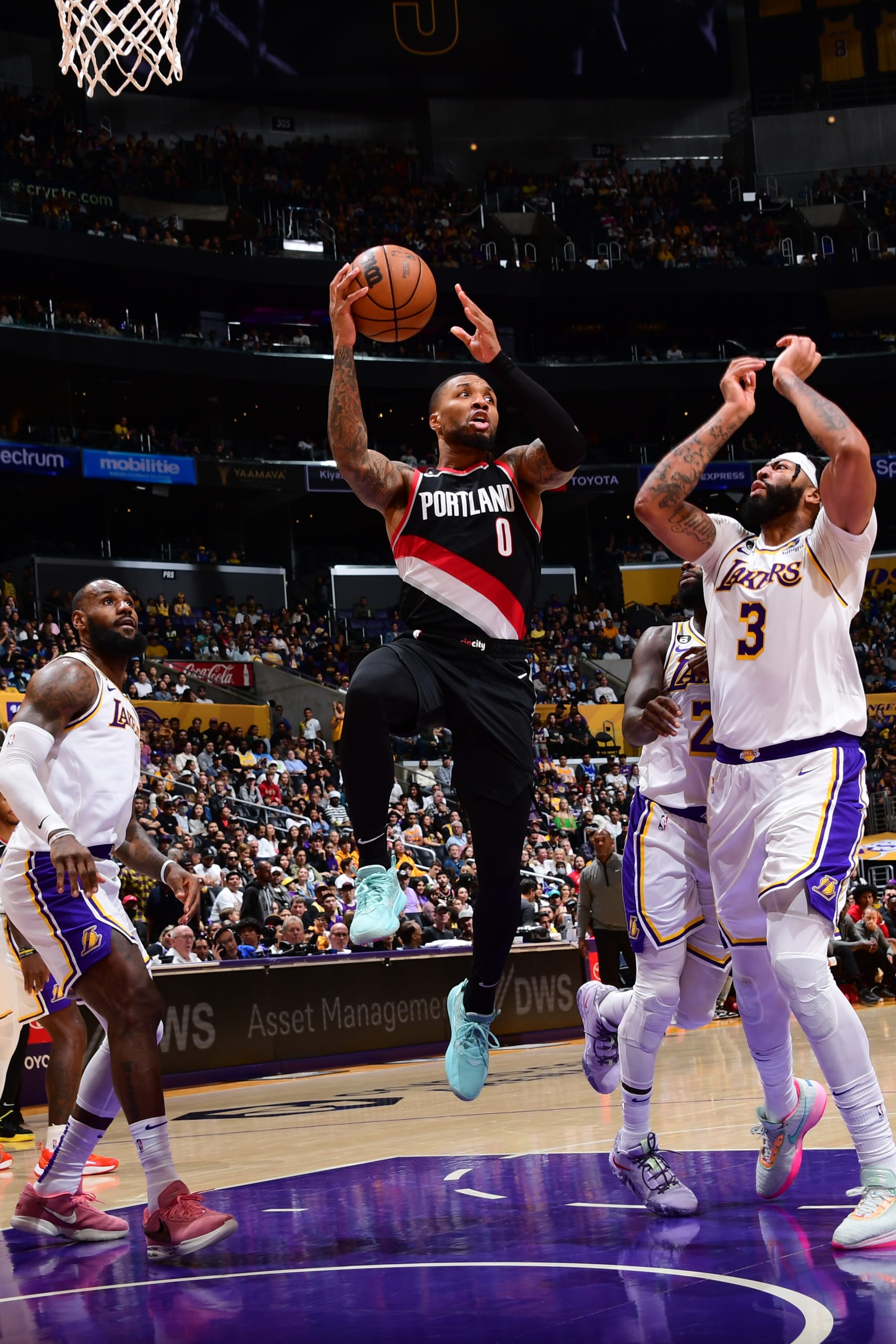 LOS ANGELES, CA - OCTOBER 23: Damian Lillard #0 of the Portland Trail Blazers drives to the basket during the game against the Los Angeles Lakers on October 23, 2022 at Crypto.Com Arena in Los Angeles, California. NOTE TO USER: User expressly acknowledges and agrees that, by downloading and/or using this Photograph, user is consenting to the terms and conditions of the Getty Images License Agreement. Mandatory Copyright Notice: Copyright 2022 NBAE (Photo by Adam Pantozzi/NBAE via Getty Images)