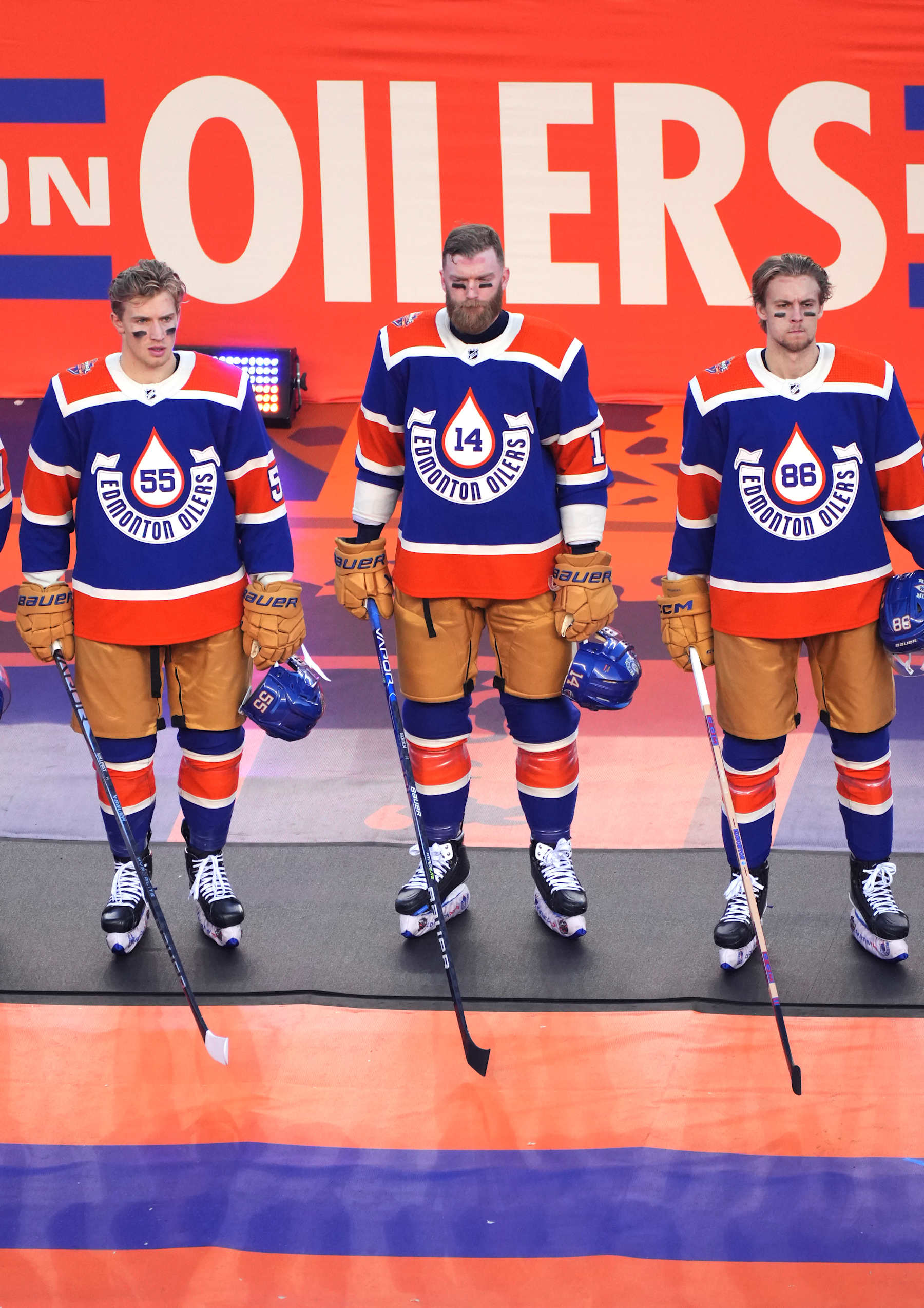 EDMONTON, ALBERTA - OCTOBER 29: The Edmonton Oilers line up during pre-game ceremonies before the 2023 Tim Hortons NHL Heritage Classic between the Calgary Flames and the Edmonton Oilers at Commonwealth Stadium on October 29, 2023 in Edmonton, Alberta. (Photo by Andre Ringuette/NHLI via Getty Images)