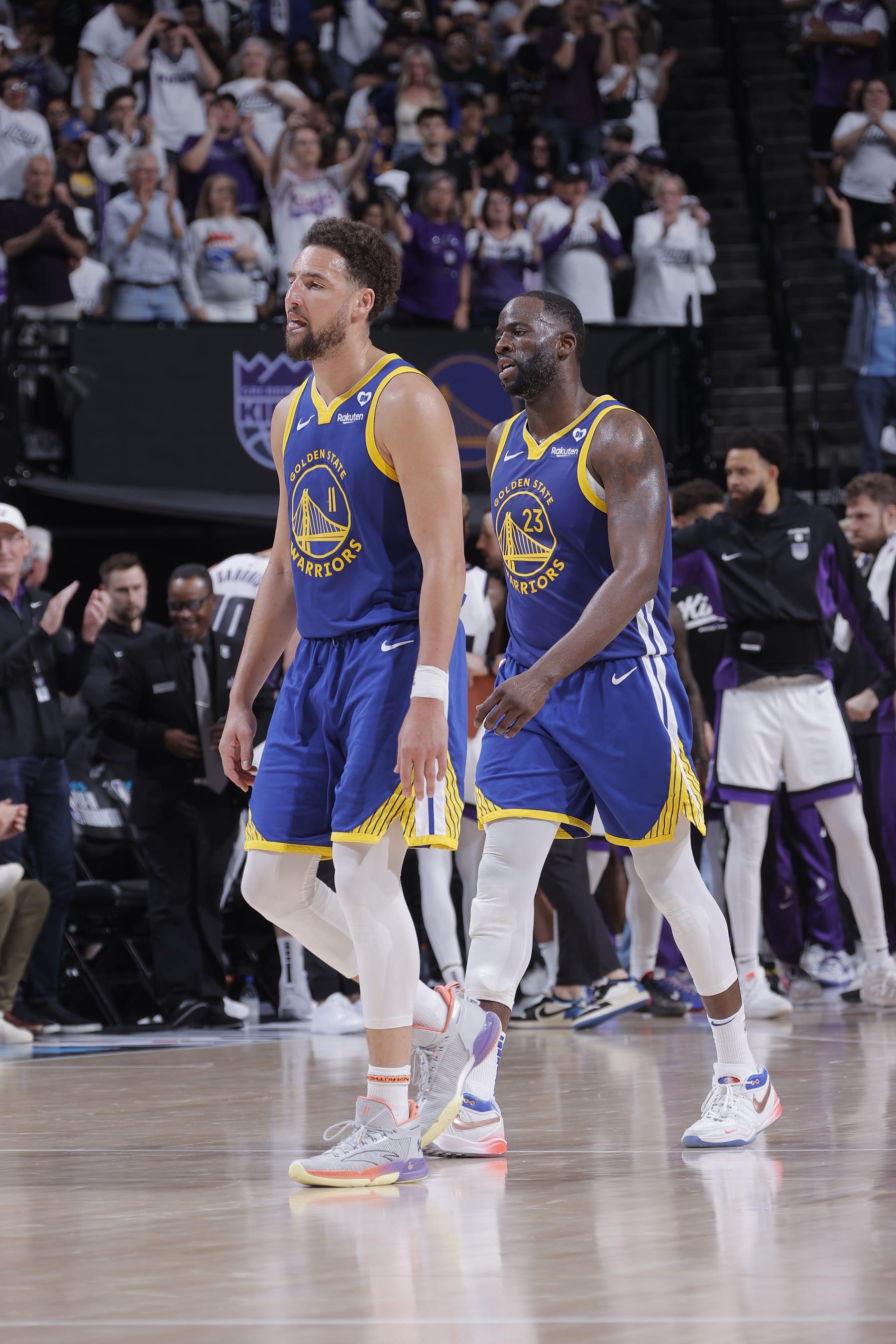 SACRAMENTO, CA - APRIL 16: Klay Thompson #11 and Draymond Green #23 of the Golden State Warriors walk to the bench during a timeout in a game against the Sacramento Kings during the 2024 Play-In Tournament on April 16, 2024 at Golden 1 Center in Sacramento, California. NOTE TO USER: User expressly acknowledges and agrees that, by downloading and or using this photograph, User is consenting to the terms and conditions of the Getty Images Agreement. Mandatory Copyright Notice: Copyright 2024 NBAE (Photo by Rocky Widner/NBAE via Getty Images)