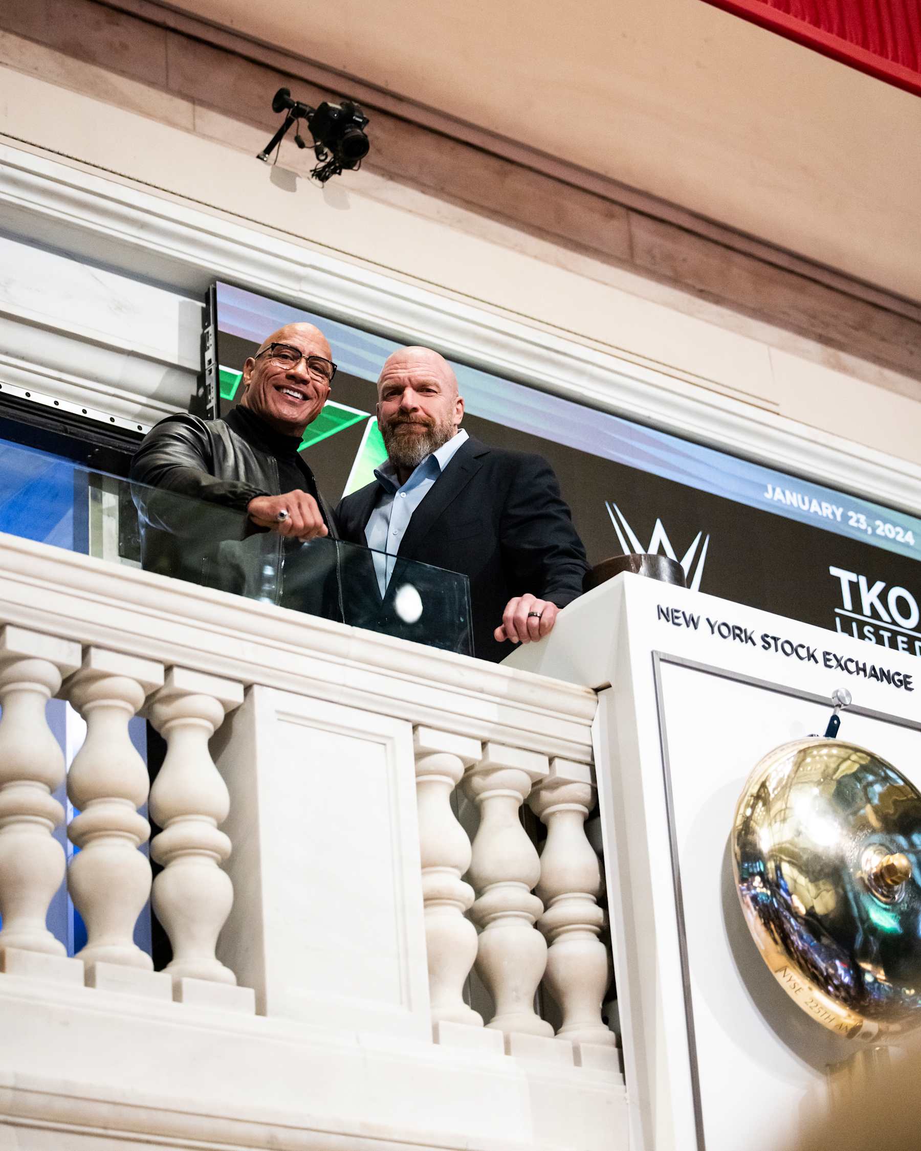 NEW YORK, NEW YORK - JANUARY 23: (L-R) Dwayne "The Rock" Johnson poses with WWE Chief Content Officer Paul Levesque during a ceremony to announce Johnson has joined the Board of Directors for TKO at New York Stock Exchange on January 23, 2024 in New York City. (Photo by Michelle Farsi/Zuffa LLC)