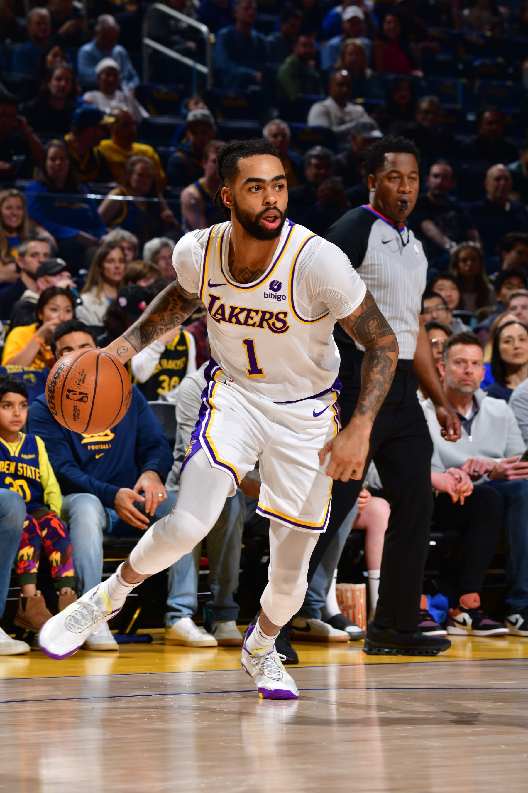 SAN FRANCISCO, CA - JANUARY 27:  D'Angelo Russell #1 of the Los Angeles Lakers handles the ball during the game against the Golden State Warriors on January 27, 2024 at Chase Center in San Francisco, California. NOTE TO USER: User expressly acknowledges and agrees that, by downloading and or using this photograph, user is consenting to the terms and conditions of Getty Images License Agreement. Mandatory Copyright Notice: Copyright 2024 NBAE (Photo by Barry Gossage/NBAE via Getty Images)