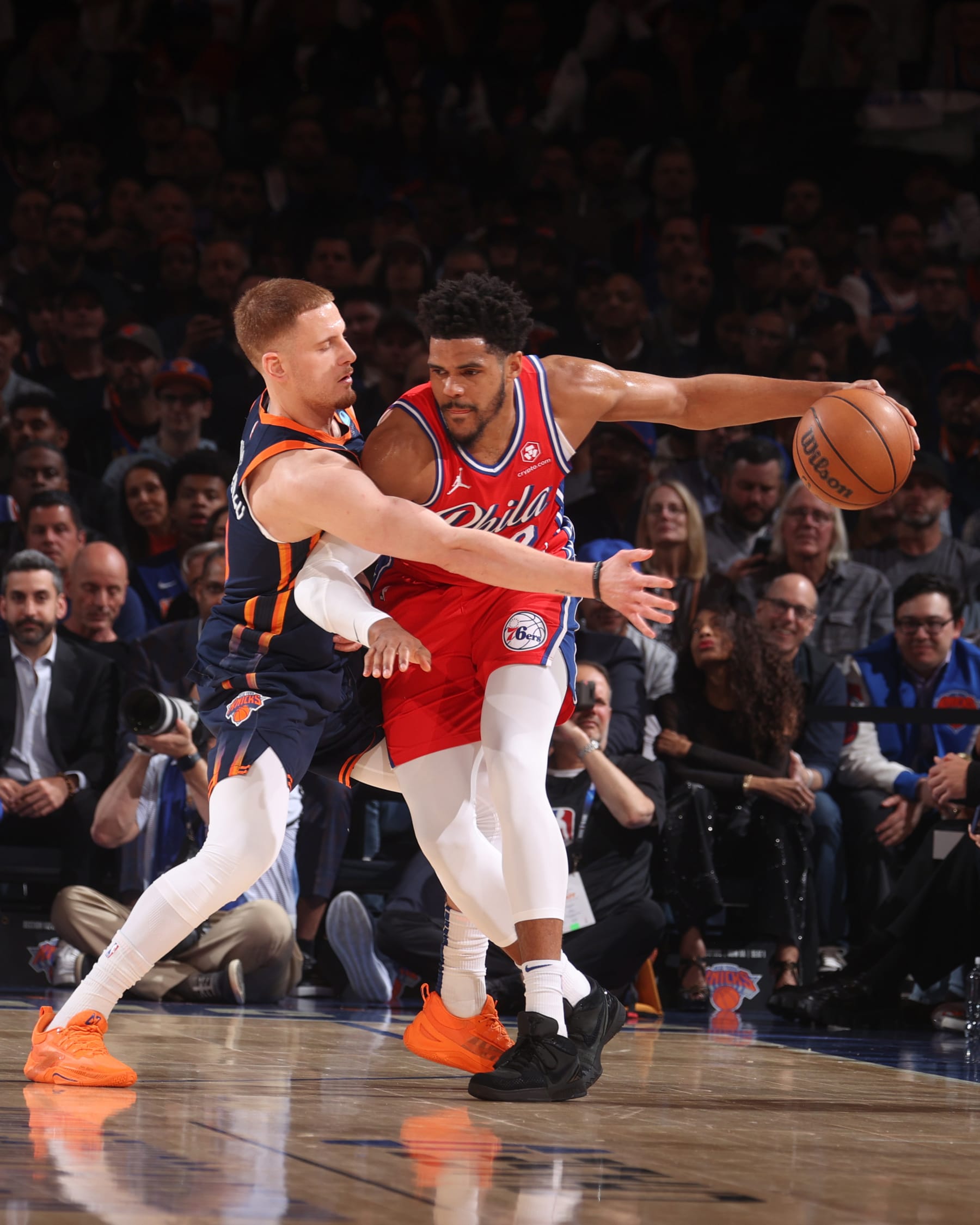 NEW YORK, NY - APRIL 22:  Donte Divincenzo #0 of the New York Knicks plays defense during the game  against Tobias Harris #12 of the Philadelphia 76ers during Round 1 Game 2 of the 2024 NBA Playoffs on April 22, 2024 at Madison Square Garden in New York City, New York.  NOTE TO USER: User expressly acknowledges and agrees that, by downloading and or using this photograph, User is consenting to the terms and conditions of the Getty Images License Agreement. Mandatory Copyright Notice: Copyright 2024 NBAE  (Photo by Nathaniel S. Butler/NBAE via Getty Images)