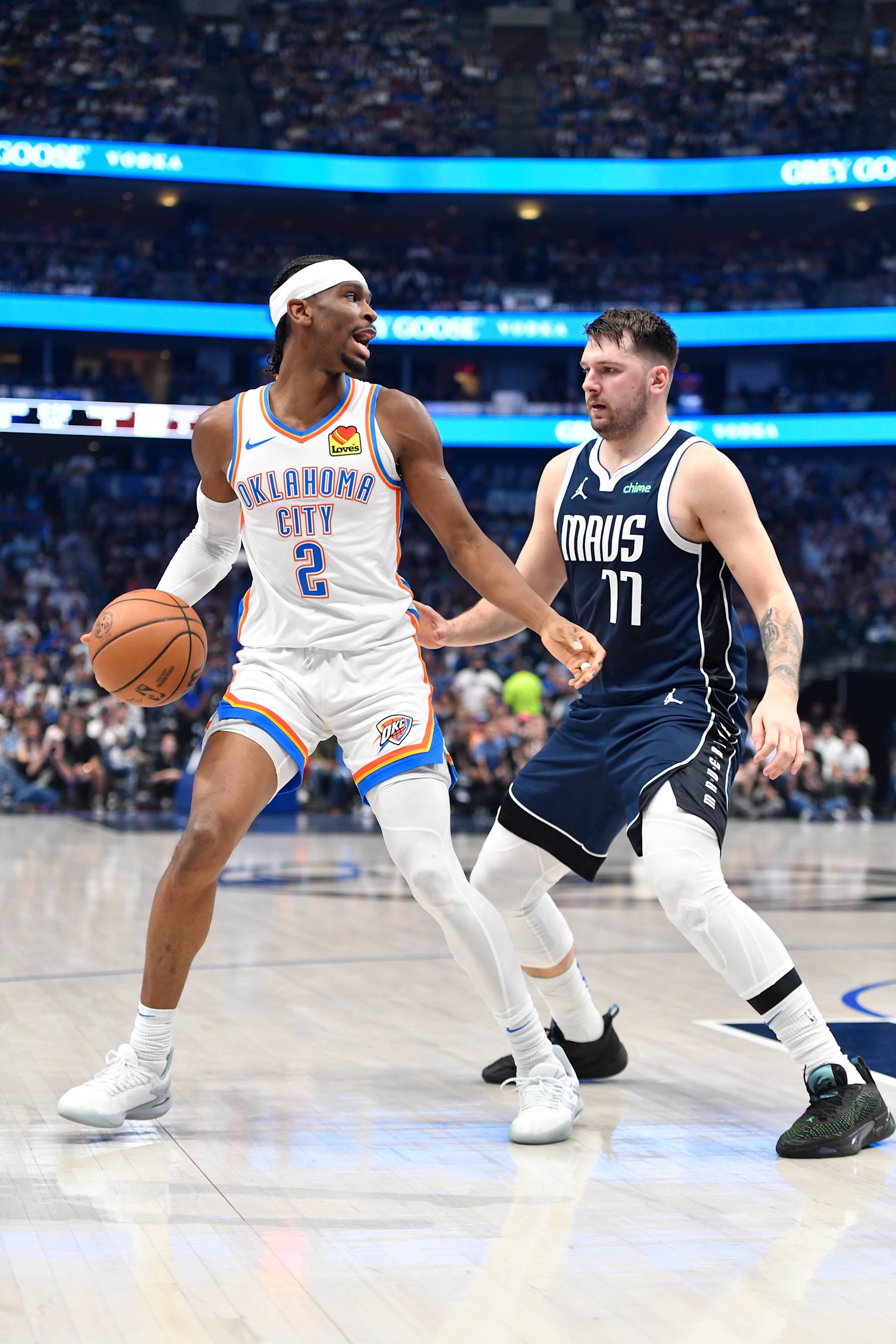 DALLAS, TX - MAY 13: Shai Gilgeous-Alexander #2 of the Oklahoma City Thunder handles the ball against Luka Doncic #77 of the Dallas Mavericks during the game during Round 2 Game 4 of the 2024 NBA Playoffs on May 13, 2024 at the American Airlines Center in Dallas, Texas. NOTE TO USER: User expressly acknowledges and agrees that, by downloading and or using this photograph, User is consenting to the terms and conditions of the Getty Images License Agreement. Mandatory Copyright Notice: Copyright 2024 NBAE (Photo by Logan Riely/NBAE via Getty Images)