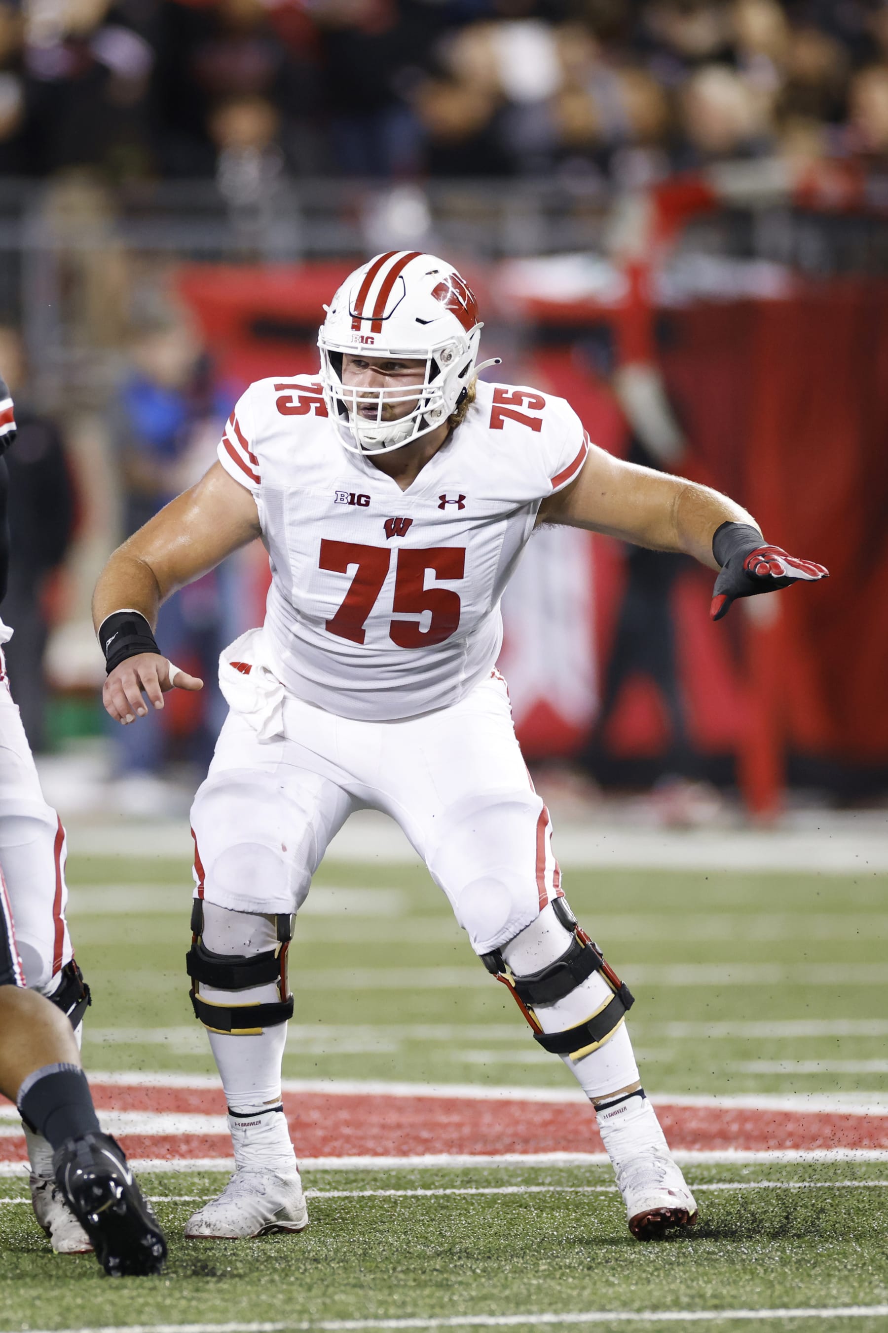 COLUMBUS, OH - SEPTEMBER 24: Wisconsin Badgers offensive lineman Joe Tippmann (75) blocks during a college football game against the Ohio State Buckeyes on September 24, 2022 at Ohio Stadium in Columbus, Ohio. (Photo by Joe Robbins/Icon Sportswire via Getty Images)
