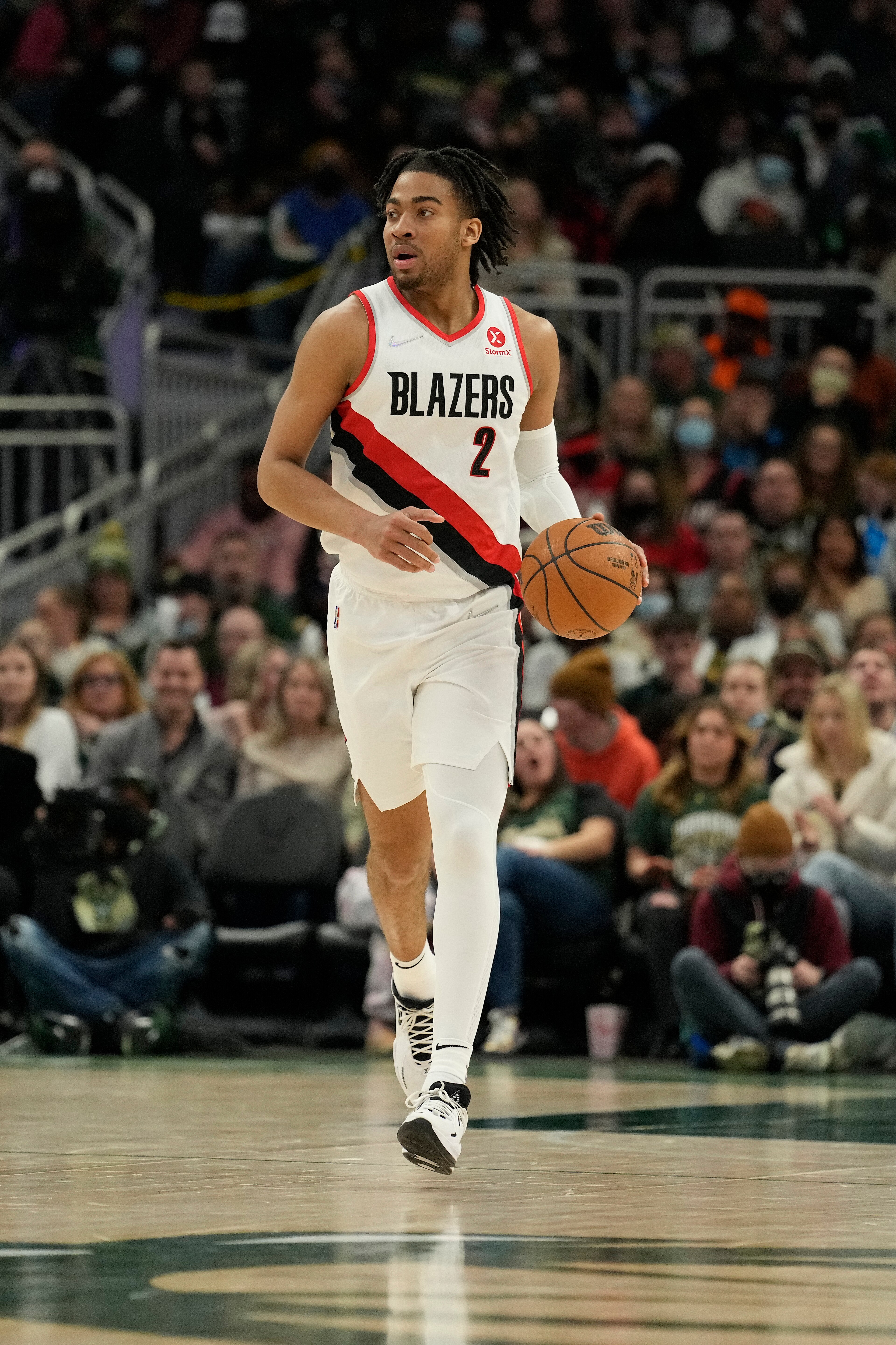 MILWAUKEE, WISCONSIN - FEBRUARY 14: Trendon Watford #2 of the Portland Trail Blazers dribbles the ball against the Milwaukee Bucks during the second half at Fiserv Forum on February 14, 2022 in Milwaukee, Wisconsin. NOTE TO USER: User expressly acknowledges and agrees that, by downloading and or using this photograph, User is consenting to the terms and conditions of the Getty Images License Agreement. (Photo by Patrick McDermott/Getty Images)