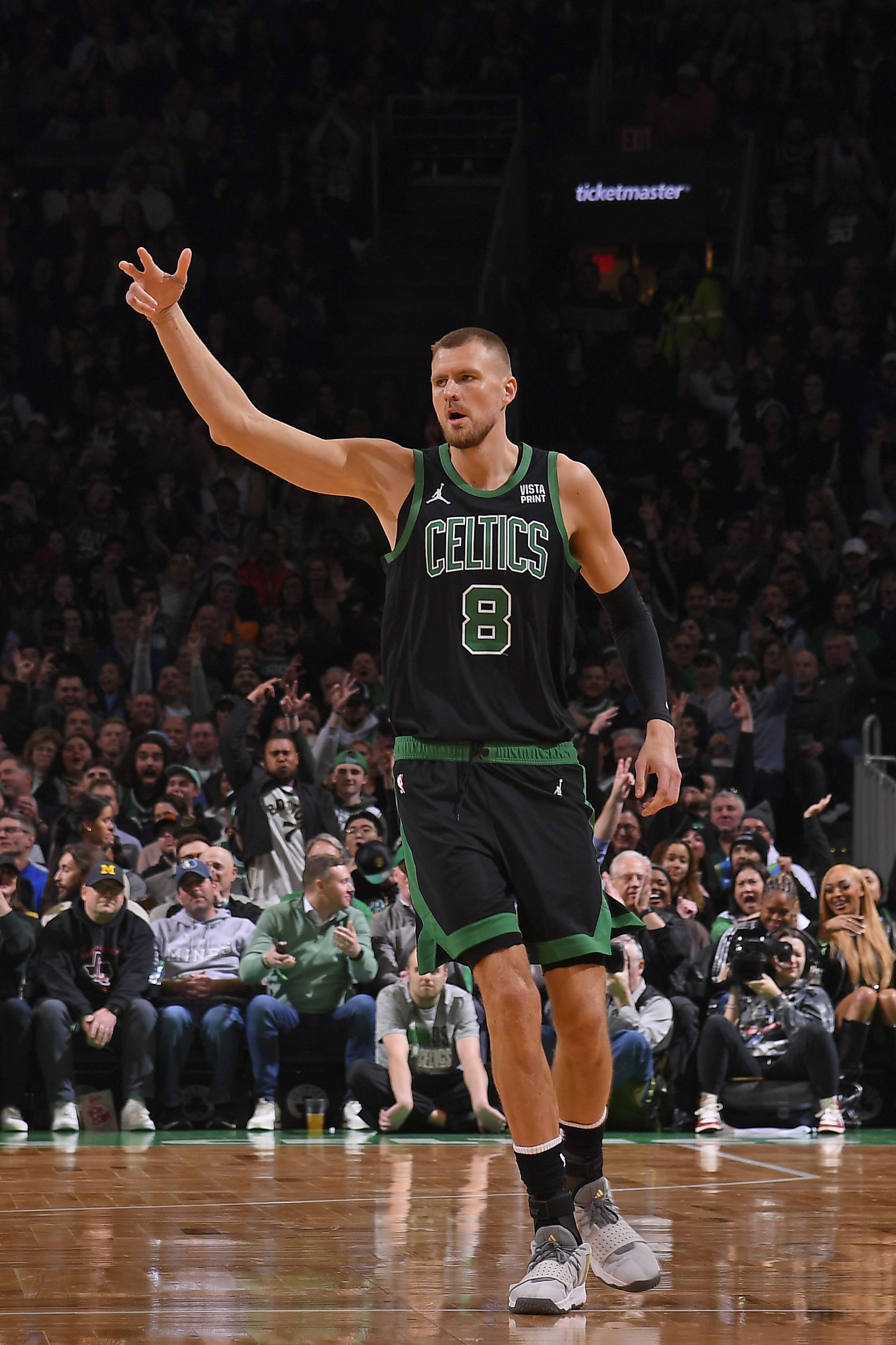 BOSTON, MA - MARCH 1: Kristaps Porzingis #8 of the Boston Celtics celebrates during the game against the Dallas Mavericks on March 1, 2024 at the TD Garden in Boston, Massachusetts. NOTE TO USER: User expressly acknowledges and agrees that, by downloading and or using this photograph, User is consenting to the terms and conditions of the Getty Images License Agreement. Mandatory Copyright Notice: Copyright 2024 NBAE  (Photo by Brian Babineau/NBAE via Getty Images)