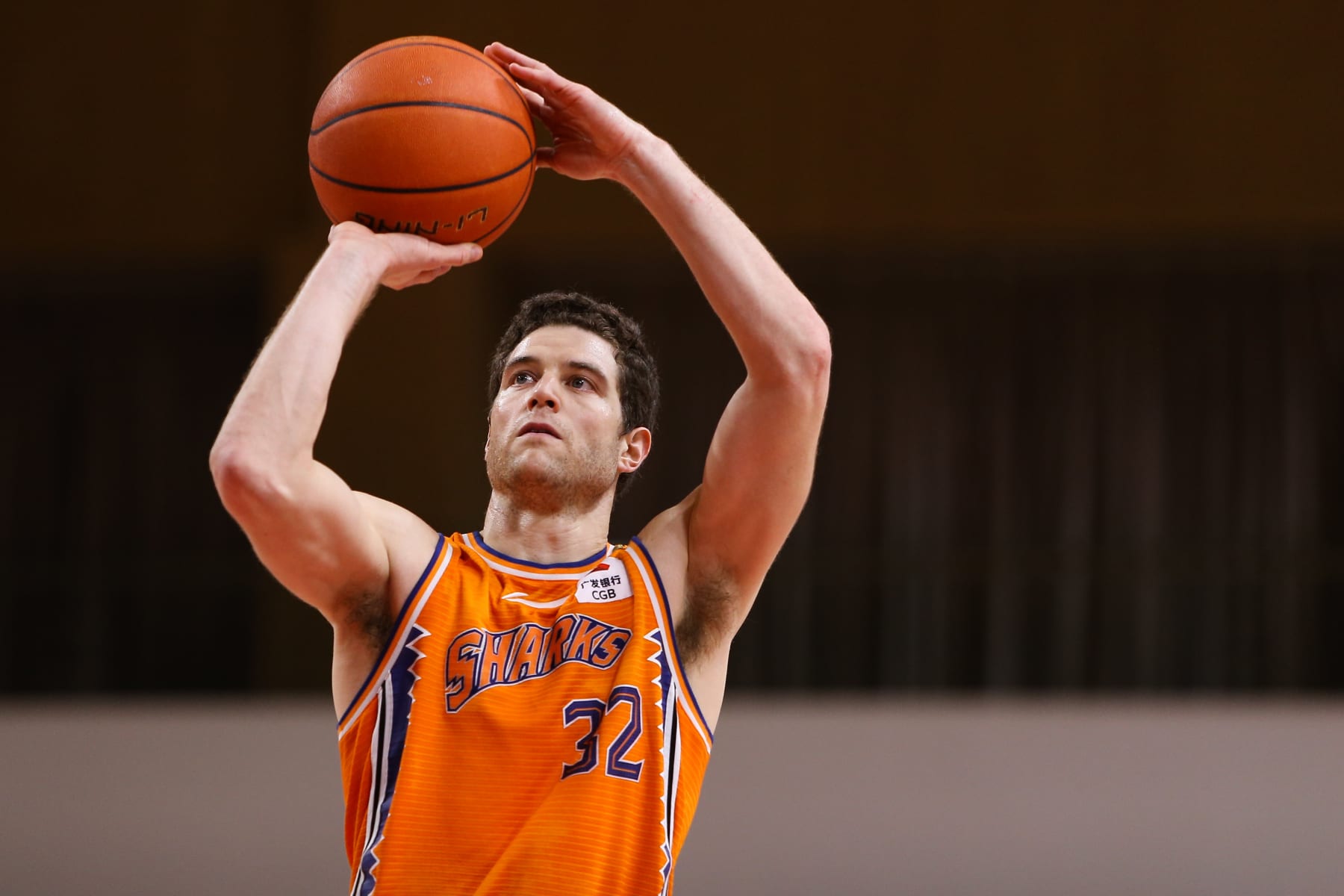 ZHUJI, CHINA - JANUARY 23: Jimmer Fredette #32 of Shanghai Sharks shoots the ball during 2020/2021 Chinese Basketball Association (CBA) League match between Xinjiang Flying Tigers and Shanghai Sharks on January 23, 2021 in Zhuji, Zhejiang Province of China. (Photo by VCG/VCG via Getty Images)