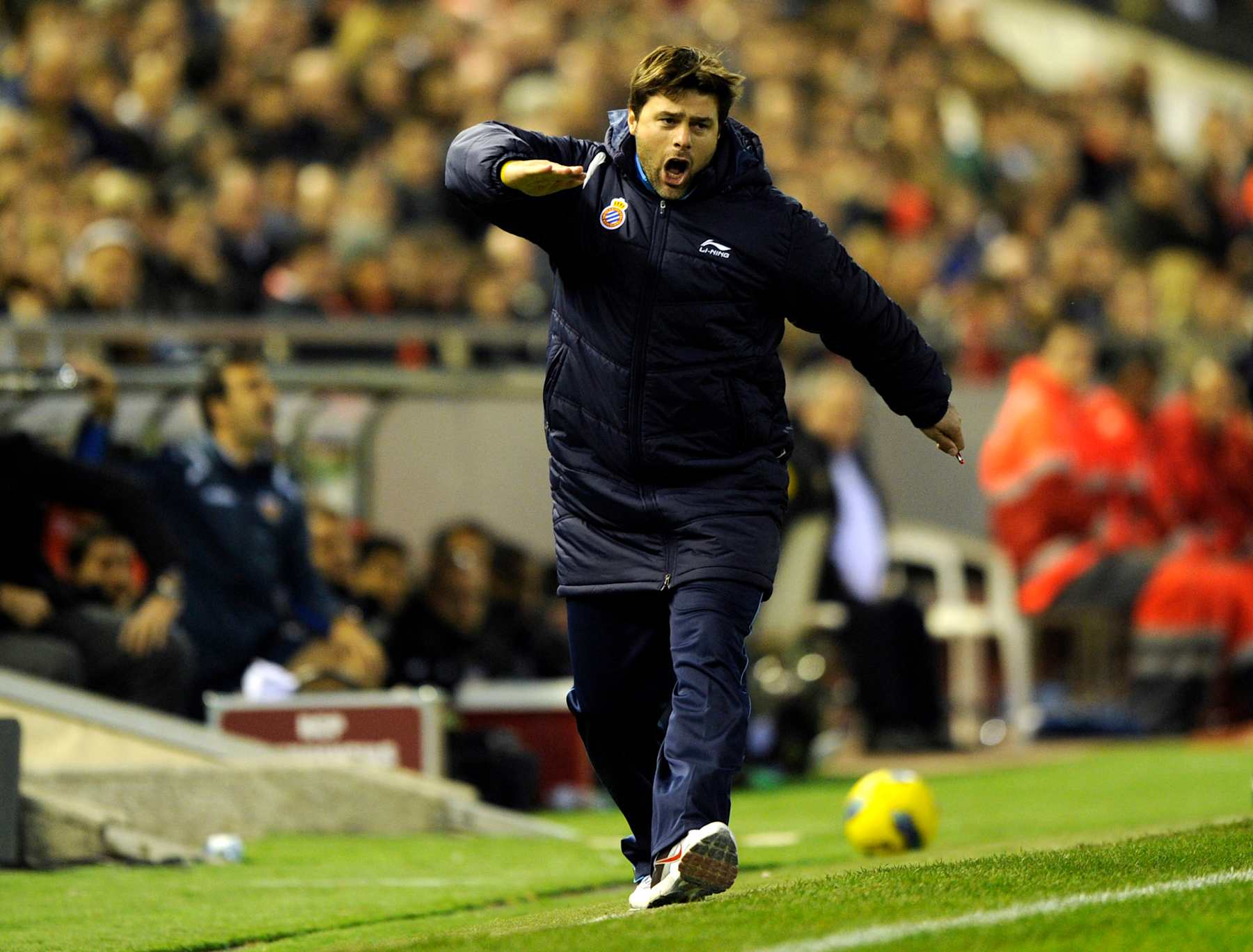 Espanyol's Argentinian coach Mauricio Pochettino reacts during the Spanish league football match Valencia CF vs Espanol on December 3, 2011 at the Mestalla stadium in Valencia. AFP PHOTO/ JOSE JORDAN (Photo credit should read JOSE JORDAN/AFP via Getty Images) Espanyol's Argentinian coach Mauricio Pochettino reacts during the Spanish league football match Valencia CF vs Espanol on December 3, 2011 at the Mestalla stadium in Valencia. AFP PHOTO/ JOSE JORDAN (Photo credit should read JOSE JORDAN/AFP via Getty Images)