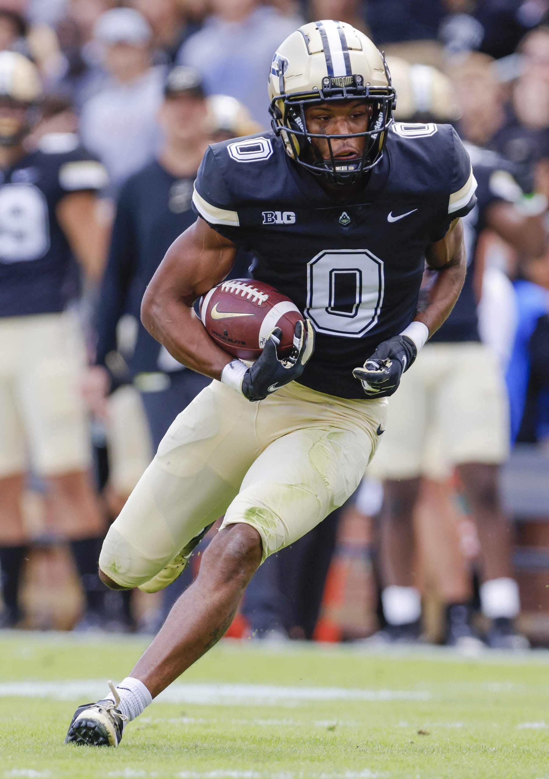WEST LAFAYETTE, IN - SEPTEMBER 25: Milton Wright #0 of the Purdue Boilermakers runs the ball during the second half against the Illinois Fighting Illini at Ross-Ade Stadium on September 25, 2021 in West Lafayette, Indiana. (Photo by Michael Hickey/Getty Images)