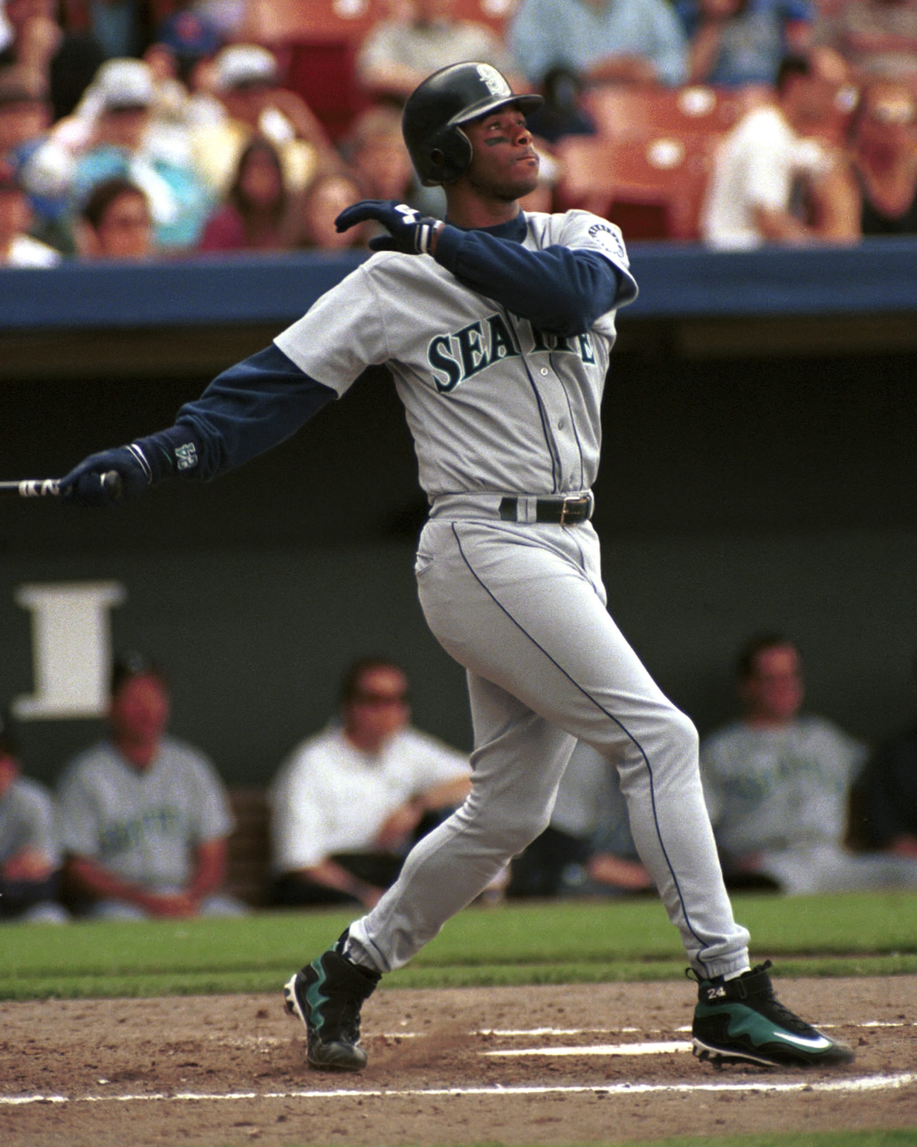 Seattle Mariner Ken Griffey Jr. hits one deep and out of the park against the Kansas City Royals at Kauffman Stadium in Kansas City, Missouri in 1995. (Photo by Peter Aiken/WireImage)
