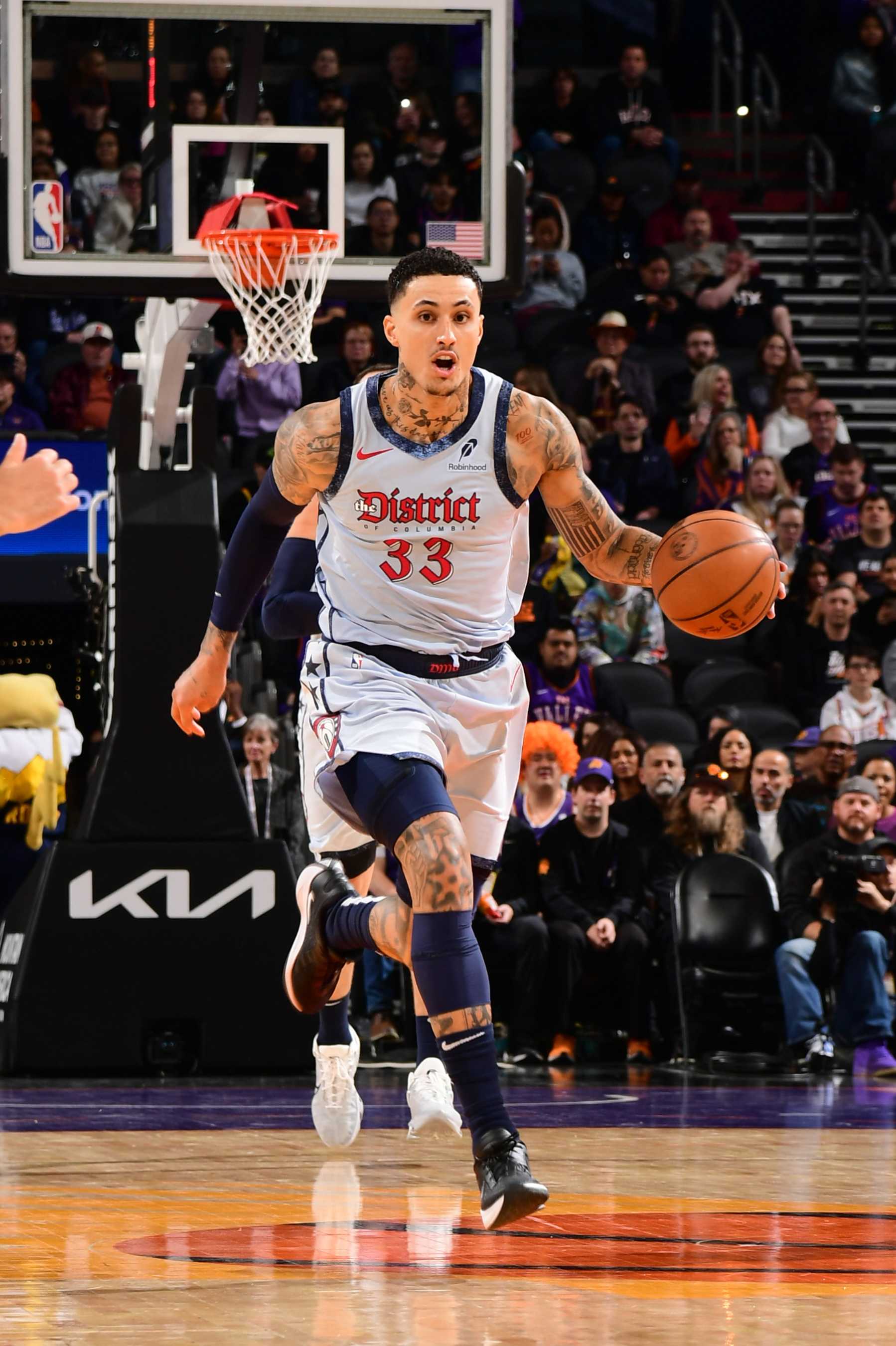 PHOENIX, AZ - JANUARY 25: Kyle Kuzma #33 of the Washington Wizards dribbles the ball during the game against the Phoenix Suns on January 25, 2025 at Footprint Center in Phoenix, Arizona. NOTE TO USER: User expressly acknowledges and agrees that, by downloading and or using this photograph, user is consenting to the terms and conditions of the Getty Images License Agreement. Mandatory Copyright Notice: Copyright 2025 NBAE (Photo by Kate Frese/NBAE via Getty Images)