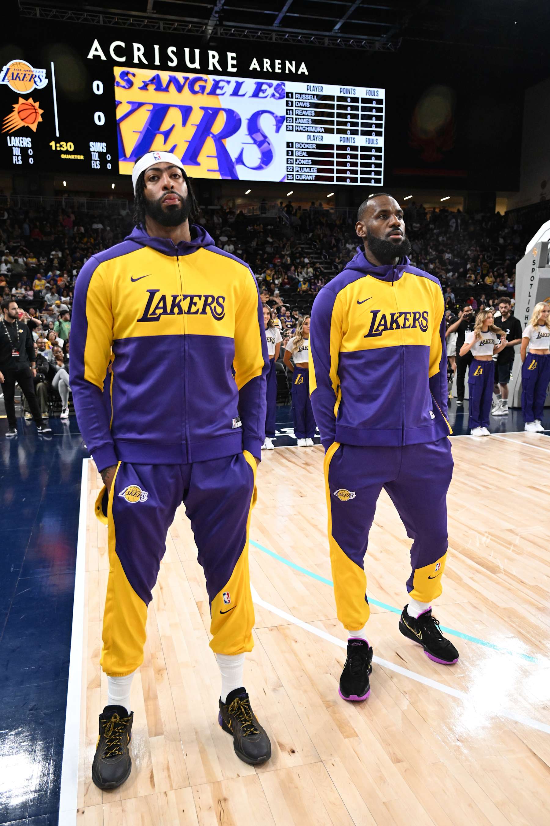 LOS ANGELES, CA - OCTOBER 6: Anthony Davis #3 and LeBron James #23 of the Los Angeles Lakers stands for the National Anthem before the game against the Phoenix Suns on October 6, 2024 at Acrisure Arena in Palm Springs, California. NOTE TO USER: User expressly acknowledges and agrees that, by downloading and/or using this Photograph, user is consenting to the terms and conditions of the Getty Images License Agreement. Mandatory Copyright Notice: Copyright 2024 NBAE (Photo by Adam Pantozzi/NBAE via Getty Images)