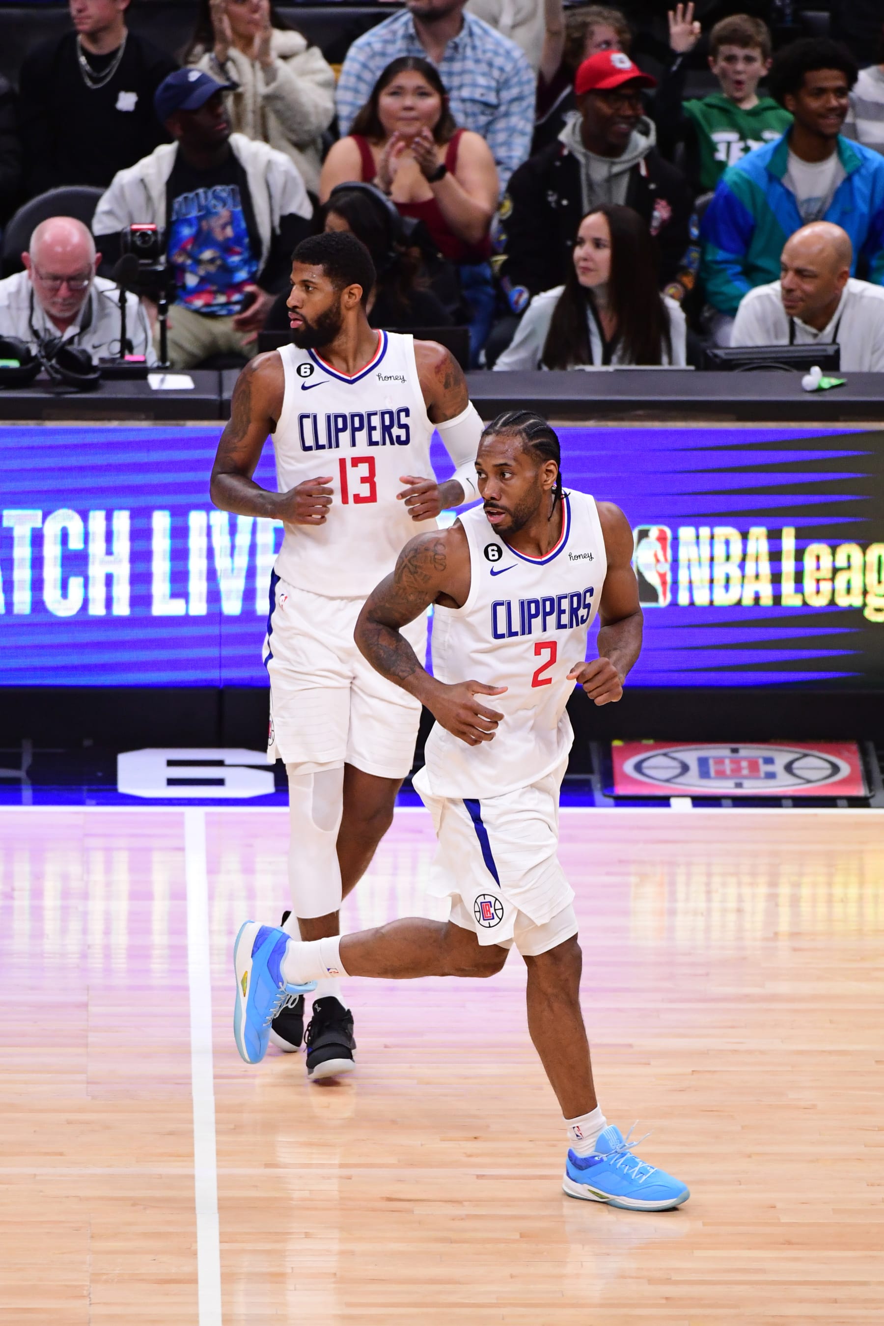 LOS ANGELES, CA - MARCH 5: Paul George #13 and Kawhi Leonard #2 of the LA Clippers look on during the game against the Memphis Grizzlies on March 5, 2023 at Crypto.Com Arena in Los Angeles, California. NOTE TO USER: User expressly acknowledges and agrees that, by downloading and/or using this Photograph, user is consenting to the terms and conditions of the Getty Images License Agreement. Mandatory Copyright Notice: Copyright 2023 NBAE (Photo by Adam Pantozzi/NBAE via Getty Images)