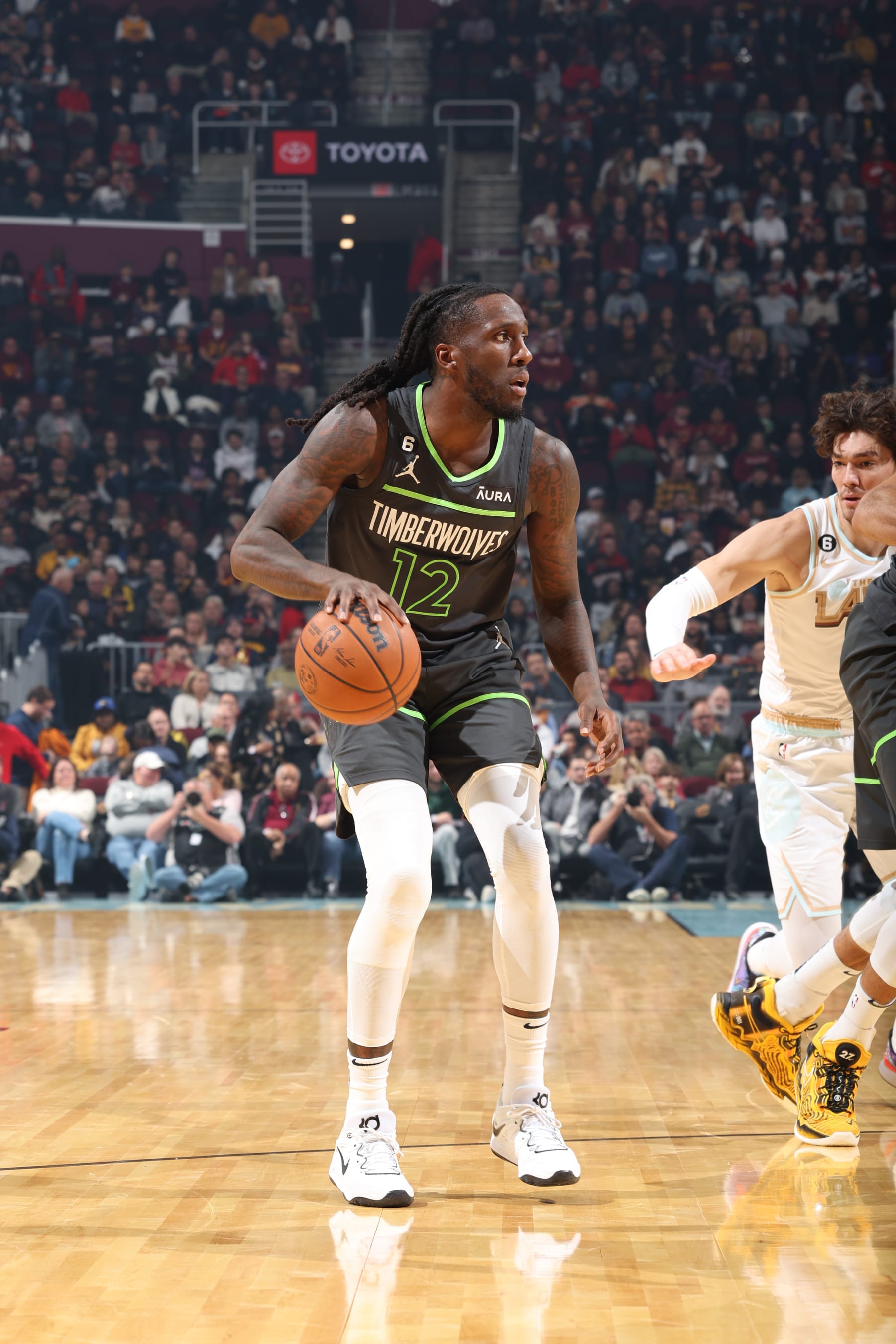 CLEVELAND, OH - NOVEMBER 13: Taurean Prince #12 of the Minnesota Timberwolves dribbles the ball during the game against the Cleveland Cavaliers on November 13, 2022 at Rocket Mortgage FieldHouse in Cleveland, Ohio. NOTE TO USER: User expressly acknowledges and agrees that, by downloading and/or using this Photograph, user is consenting to the terms and conditions of the Getty Images License Agreement. Mandatory Copyright Notice: Copyright 2022 NBAE (Photo by Jeff Haynes/NBAE via Getty Images)