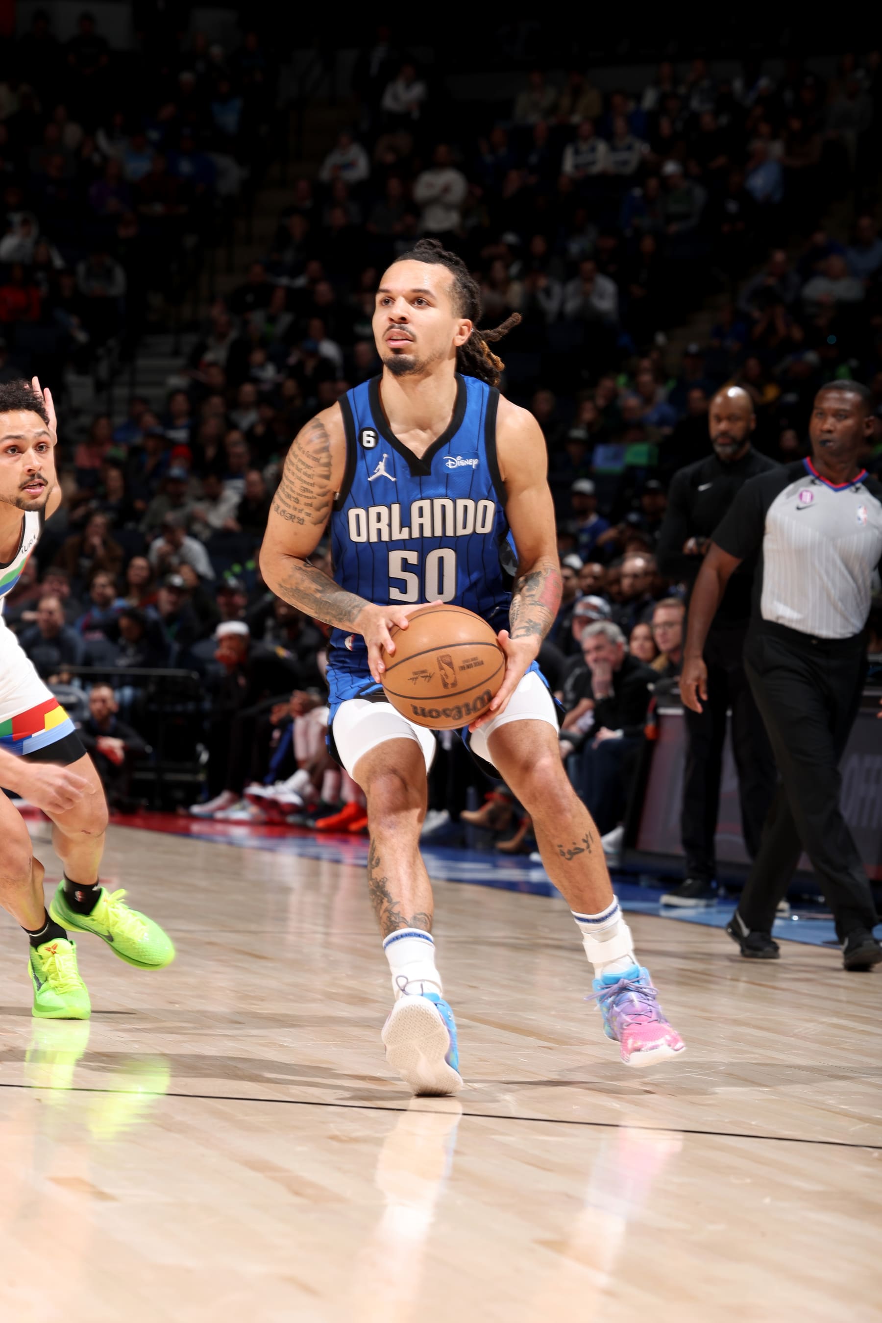 MINNEAPOLIS, MN -  FEBRUARY 3: Cole Anthony #50 of the Orlando Magic drives to the basket against the Minnesota Timberwolves on February 3, 2023 at Target Center in Minneapolis, Minnesota. NOTE TO USER: User expressly acknowledges and agrees that, by downloading and or using this Photograph, user is consenting to the terms and conditions of the Getty Images License Agreement. Mandatory Copyright Notice: Copyright 2023 NBAE (Photo by David Sherman/NBAE via Getty Images)