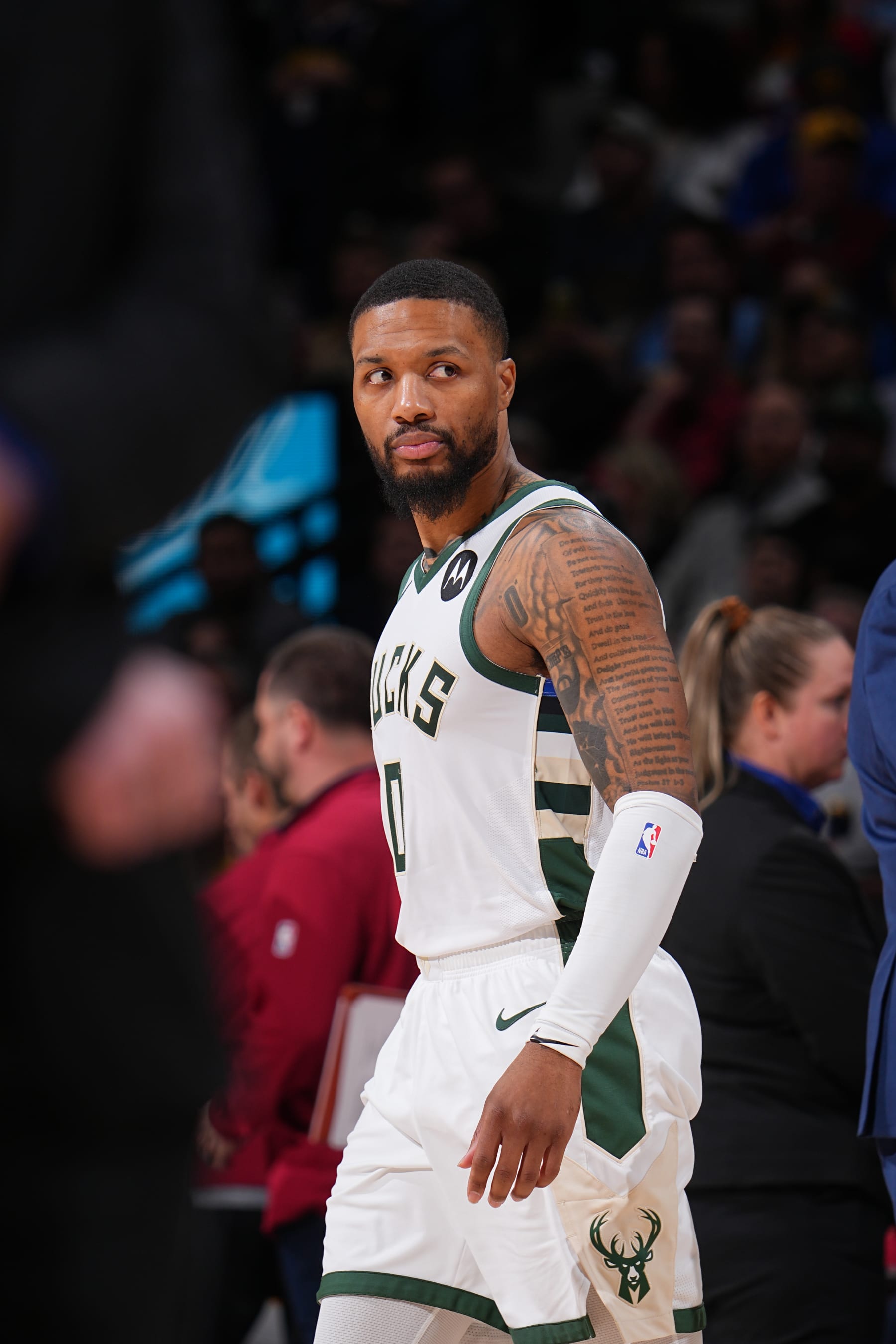 DENVER, CO - JANUARY 29: Damian Lillard #0 of the Milwaukee Bucks looks on during the game against the Denver Nuggets on January 29, 2024 at the Ball Arena in Denver, Colorado. NOTE TO USER: User expressly acknowledges and agrees that, by downloading and/or using this Photograph, user is consenting to the terms and conditions of the Getty Images License Agreement. Mandatory Copyright Notice: Copyright 2024 NBAE (Photo by Bart Young/NBAE via Getty Images)