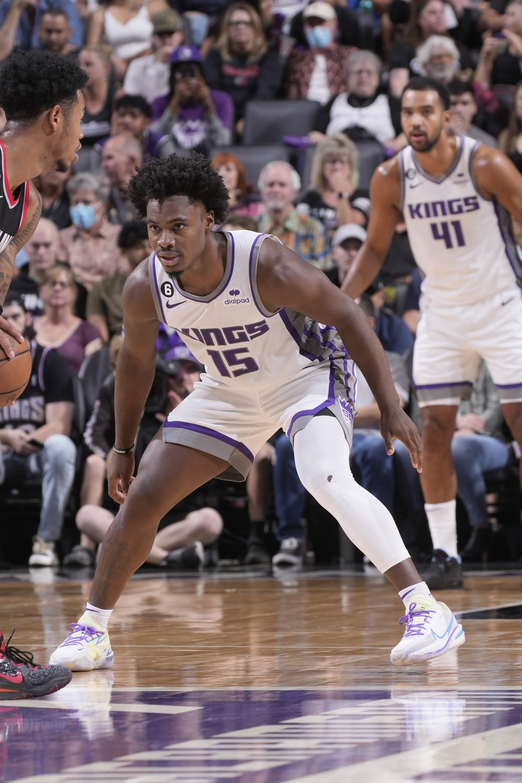 SACRAMENTO, CA - OCTOBER 9: Davion Mitchell #15 of the Sacramento Kings defends against the Portland Trail Blazers on October 9, 2022 at Golden 1 Center in Sacramento, California. NOTE TO USER: User expressly acknowledges and agrees that, by downloading and or using this photograph, User is consenting to the terms and conditions of the Getty Images Agreement. Mandatory Copyright Notice: Copyright 2022 NBAE (Photo by Rocky Widner/NBAE via Getty Images)