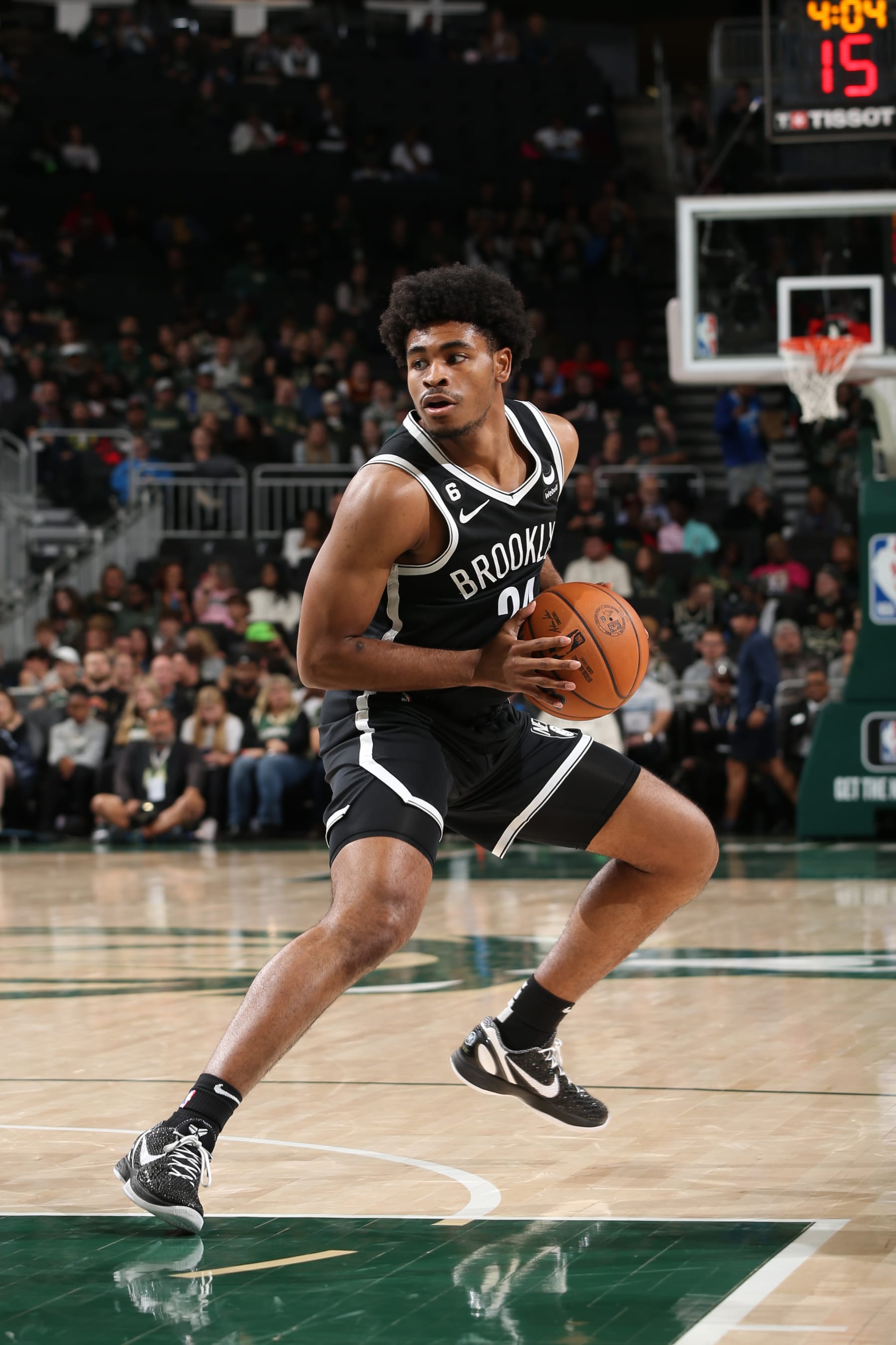 MILWAUKEE, WI - OCTOBER 12: Cam Thomas #24 of the Brooklyn Nets handles the ball during the game against the Milwaukee Bucks  on October 12, 2022 at the Fiserv Forum Center in Milwaukee, Wisconsin. NOTE TO USER: User expressly acknowledges and agrees that, by downloading and or using this Photograph, user is consenting to the terms and conditions of the Getty Images License Agreement. Mandatory Copyright Notice: Copyright 2022 NBAE (Photo by Gary Dineen/NBAE via Getty Images).