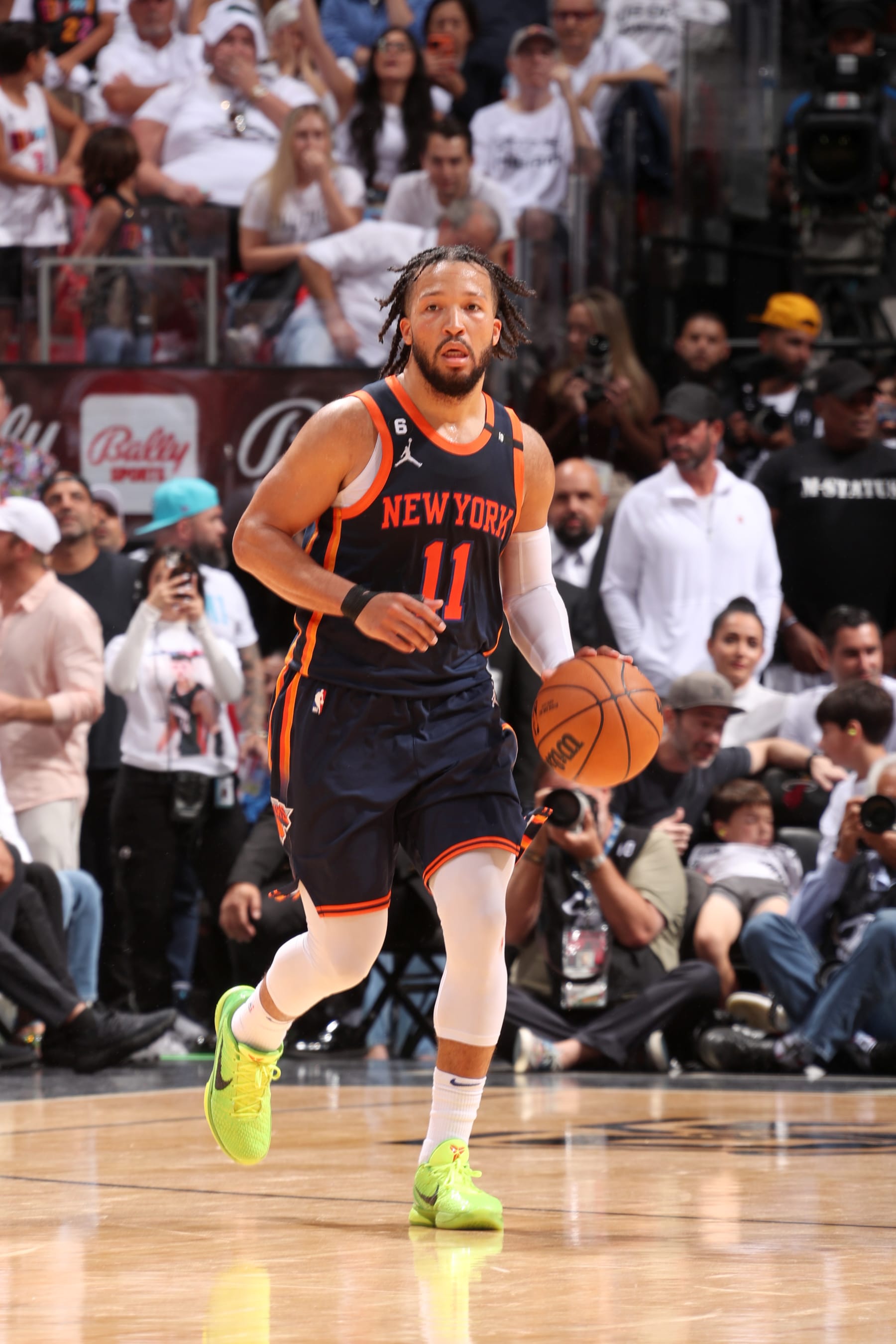 MIAMI, FL - MAY 12:  Jalen Brunson #11 of the New York Knicks dribbles the ball during Game 6 of the 2023 NBA Playoffs Eastern Conference Semi-Finals against the Miami Heat on May 12, 2023 at Kaseya Center in Miami, Florida. NOTE TO USER: User expressly acknowledges and agrees that, by downloading and or using this Photograph, user is consenting to the terms and conditions of the Getty Images License Agreement. Mandatory Copyright Notice: Copyright 2023 NBAE (Photo by Issac Baldizon/NBAE via Getty Images)