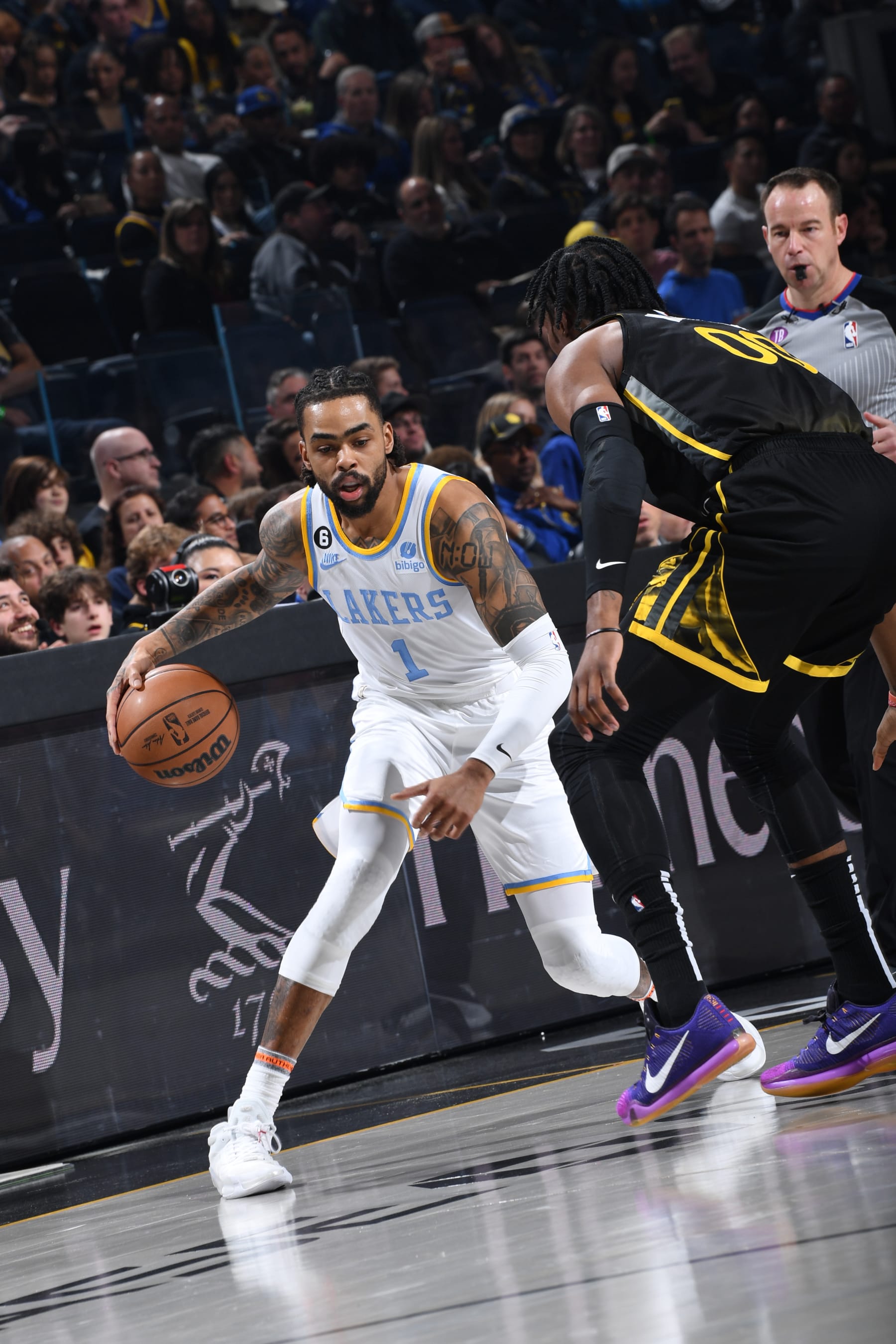 SAN FRANCISCO, CA - FEBRUARY 11: D'Angelo Russell #1 of the Los Angeles Lakers dribbles the ball during the game against the Golden State Warriors on February 11, 2023 at Chase Center in San Francisco, California. NOTE TO USER: User expressly acknowledges and agrees that, by downloading and or using this photograph, user is consenting to the terms and conditions of Getty Images License Agreement. Mandatory Copyright Notice: Copyright 2023 NBAE (Photo by Noah Graham/NBAE via Getty Images) SAN FRANCISCO, CA - FEBRUARY 11: D'Angelo Russell #1 of the Los Angeles Lakers dribbles the ball during the game against the Golden State Warriors on February 11, 2023 at Chase Center in San Francisco, California. NOTE TO USER: User expressly acknowledges and agrees that, by downloading and or using this photograph, user is consenting to the terms and conditions of Getty Images License Agreement. Mandatory Copyright Notice: Copyright 2023 NBAE (Photo by Noah Graham/NBAE via Getty Images)