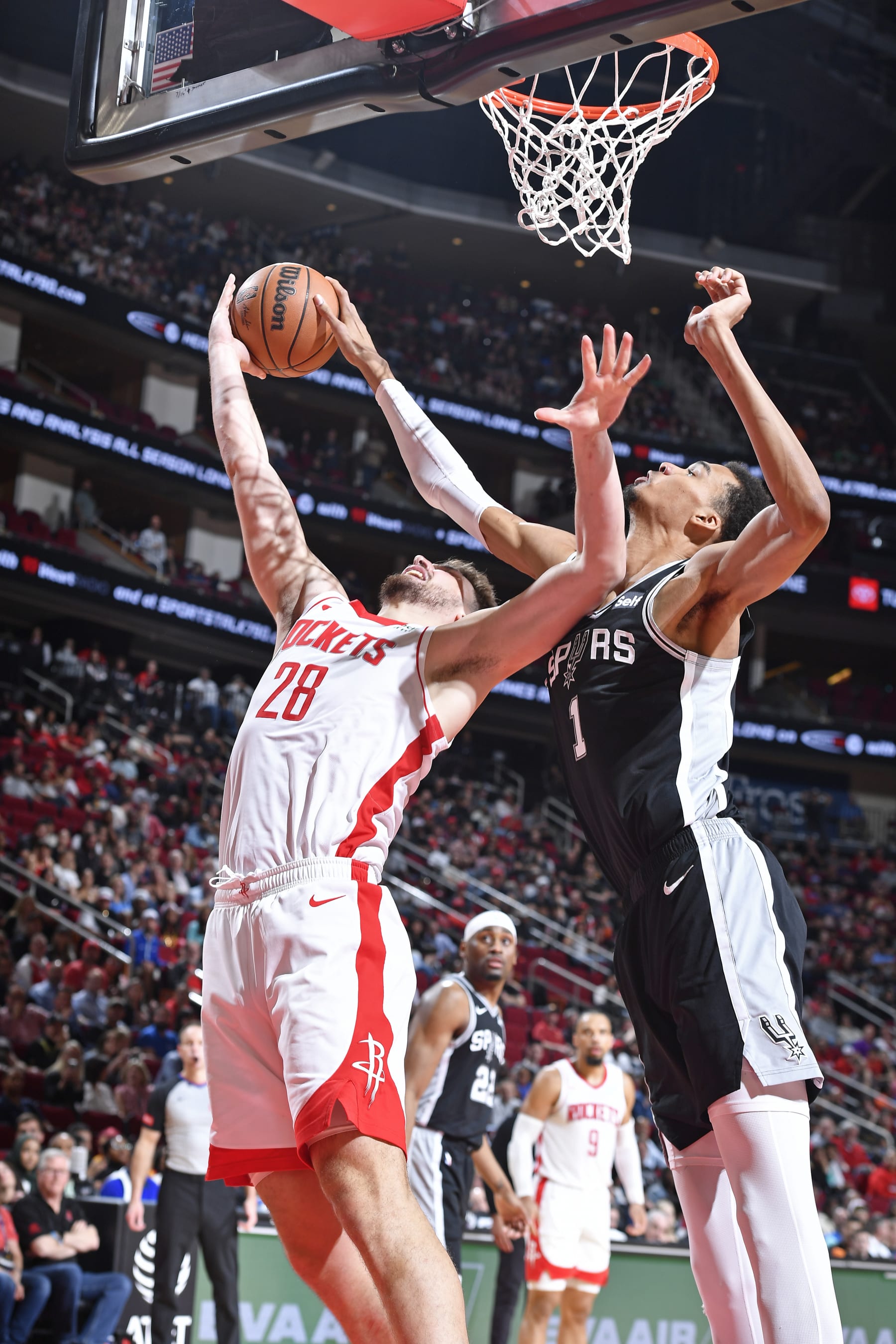 HOUSTON, TX - MARCH 5:  Victor Wembanyama #1 of the San Antonio Spurs blocks a shot during the game against the Houston Rockets on March 5, 2024 at the Toyota Center in Houston, Texas. NOTE TO USER: User expressly acknowledges and agrees that, by downloading and or using this photograph, User is consenting to the terms and conditions of the Getty Images License Agreement. Mandatory Copyright Notice: Copyright 2024 NBAE (Photo by Logan Riely/NBAE via Getty Images)