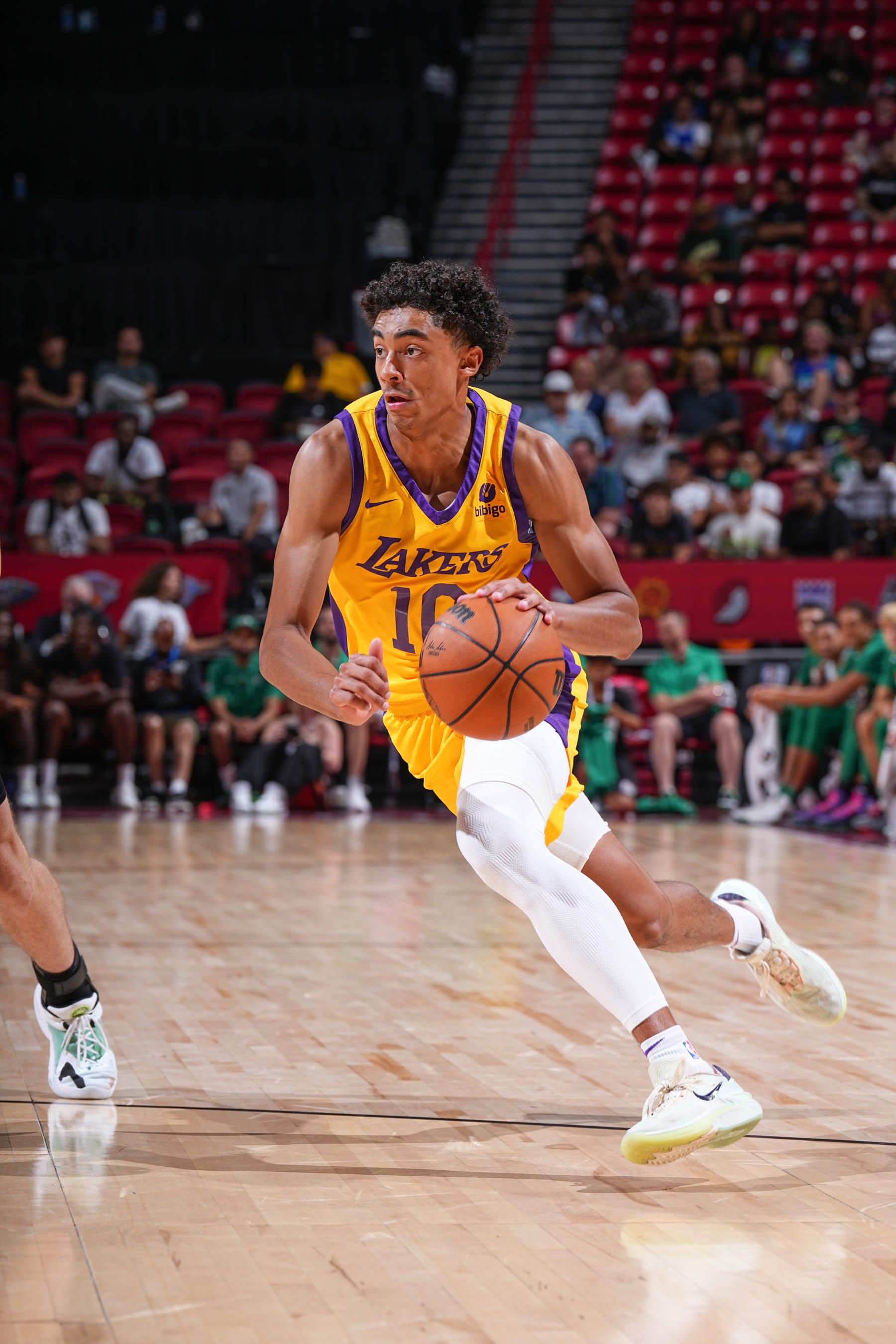 LAS VEGAS, NV - JULY 12:  Max Christie #10 of the Los Angeles Lakers handles the ball during the game  during the 2023 NBA Las Vegas Summer League on July 12, 2023 at the Thomas & Mack Center in Las Vegas, Nevada. NOTE TO USER: User expressly acknowledges and agrees that, by downloading and or using this Photograph, User is consenting to the terms and conditions of the Getty Images License Agreement. Mandatory Copyright Notice: Copyright 2023 NBAE (Photo by Garrett Ellwood/NBAE via Getty Images)