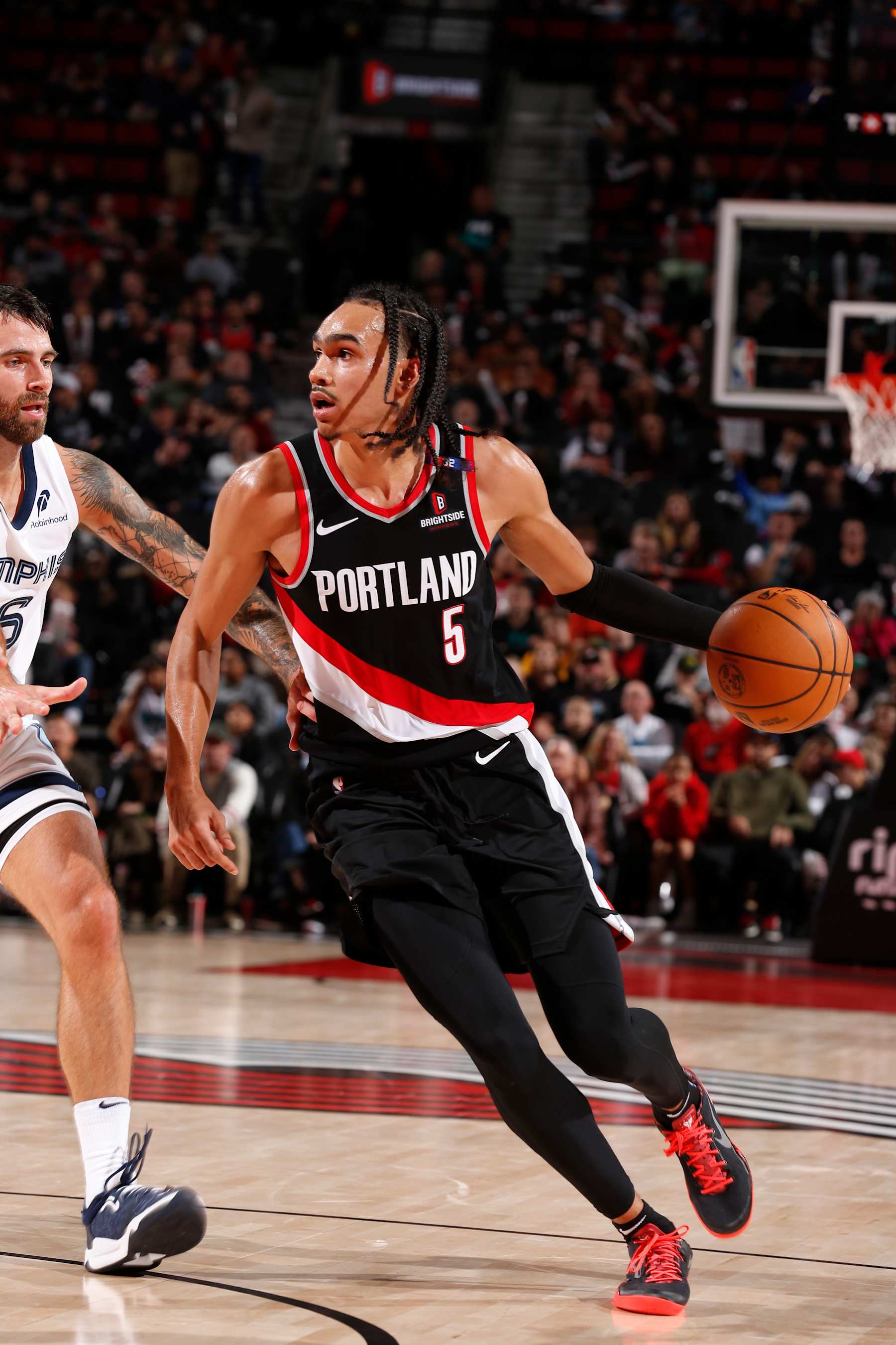 PORTLAND, OR - NOVEMBER 10: Dalano Banton #5 of the Portland Trail Blazers dribbles the ball during the game against the Memphis Grizzlies on November 10, 2024 at the Moda Center Arena in Portland, Oregon. NOTE TO USER: User expressly acknowledges and agrees that, by downloading and or using this photograph, user is consenting to the terms and conditions of the Getty Images License Agreement. Mandatory Copyright Notice: Copyright 2024 NBAE (Photo by Cameron Browne/NBAE via Getty Images)