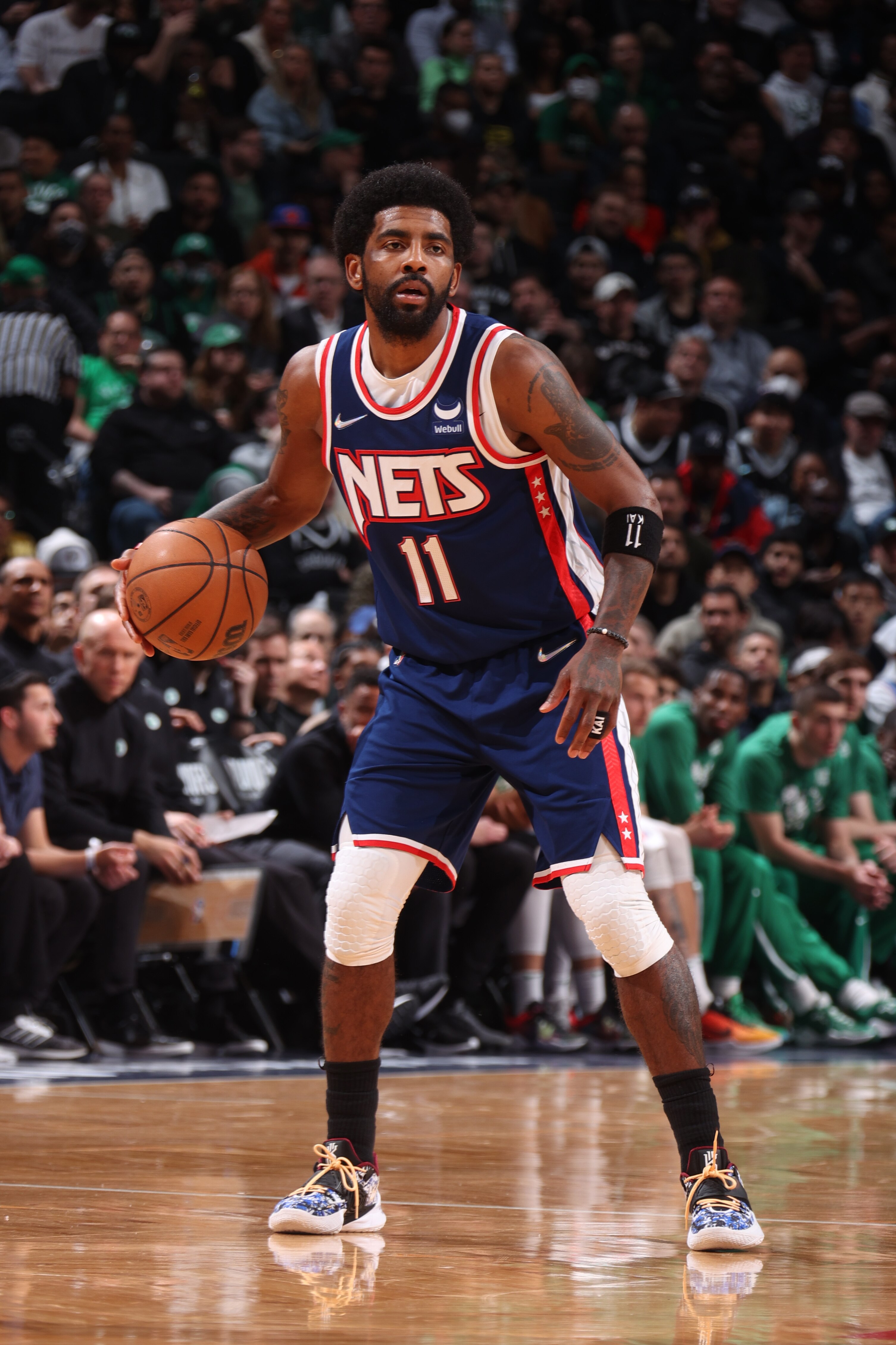 BROOKLYN, NY - APRIL 25: Kyrie Irving #11 of the Brooklyn Nets dribbles the ball against the Boston Celtics during Round 1 Game 4 of the 2022 NBA Playoffs on April 25, 2022 at Barclays Center in Brooklyn, New York. NOTE TO USER: User expressly acknowledges and agrees that, by downloading and or using this Photograph, user is consenting to the terms and conditions of the Getty Images License Agreement. Mandatory Copyright Notice: Copyright 2022 NBAE (Photo by Nathaniel S. Butler/NBAE via Getty Images)