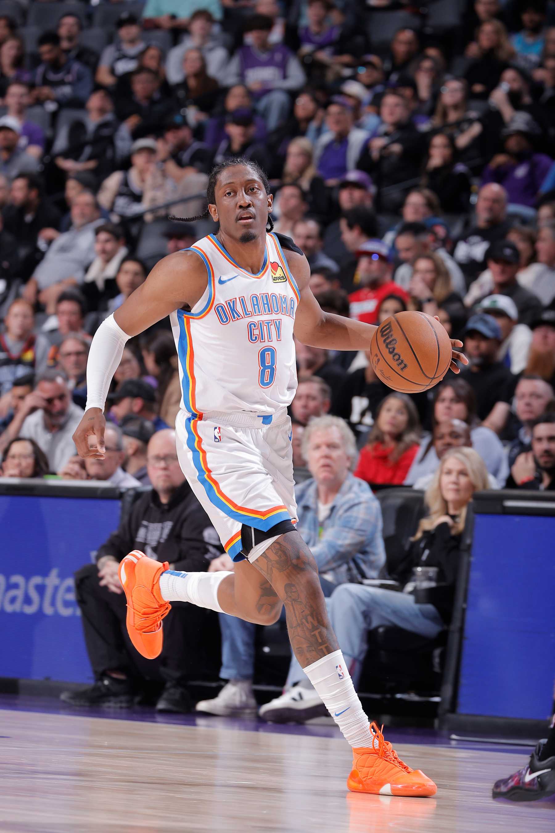 SACRAMENTO, CA - NOVEMBER 25: Jalen Williams #8 of the Oklahoma City Thunder brings the ball up the court during the game against the Sacramento Kings on November 25, 2024 at Golden 1 Center in Sacramento, California. NOTE TO USER: User expressly acknowledges and agrees that, by downloading and or using this photograph, User is consenting to the terms and conditions of the Getty Images Agreement. Mandatory Copyright Notice: Copyright 2024 NBAE (Photo by Rocky Widner/NBAE via Getty Images)