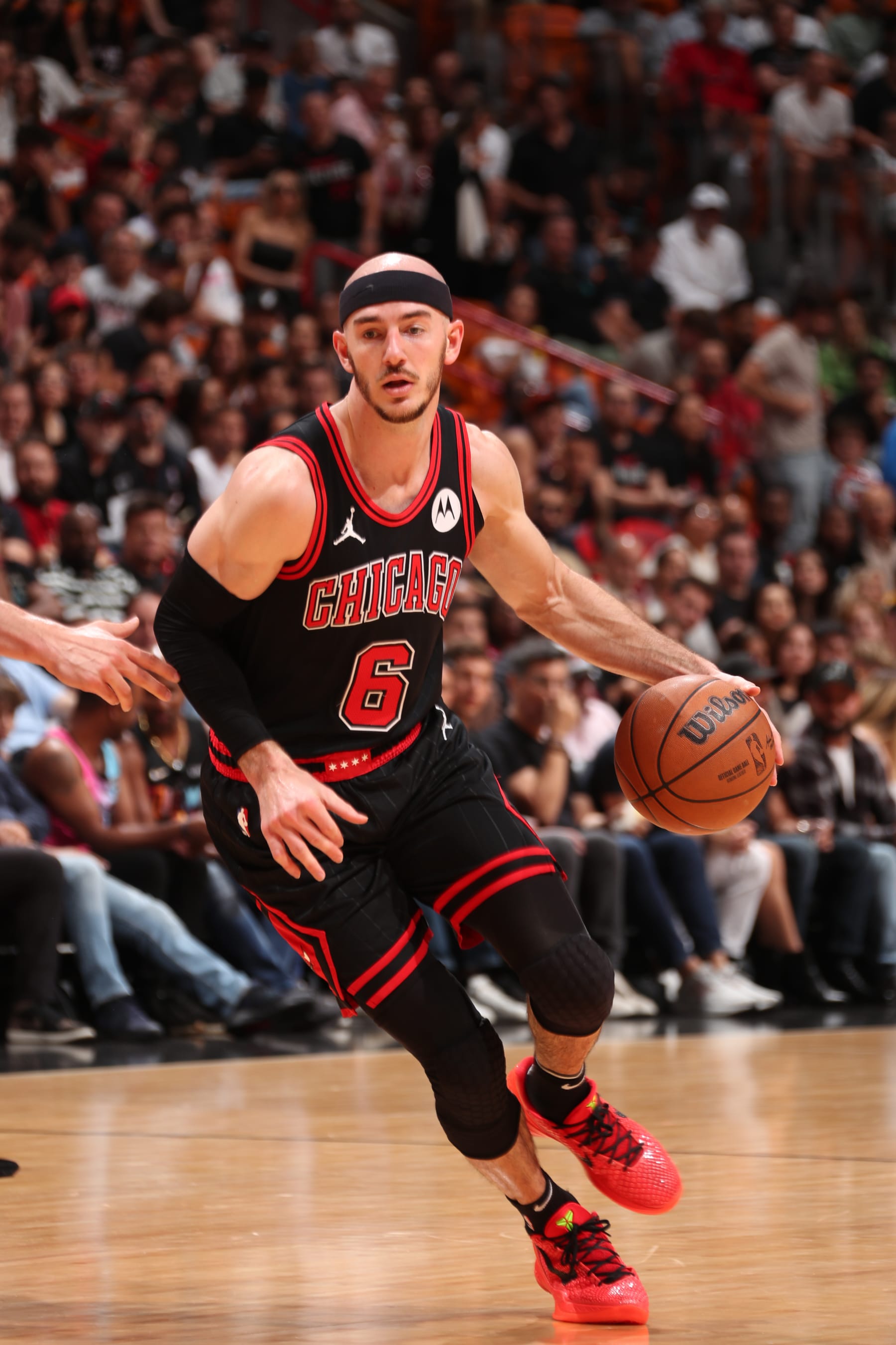 MIAMI, FL - APRIL 19: Alex Caruso #6 of the Chicago Bulls dribbles the ball during the game against the Miami Heat during the 2024 Play-In Tournament on April 19, 2024 at Kaseya Center in Miami, Florida. NOTE TO USER: User expressly acknowledges and agrees that, by downloading and or using this Photograph, user is consenting to the terms and conditions of the Getty Images License Agreement. Mandatory Copyright Notice: Copyright 2024 NBAE (Photo by Issac Baldizon/NBAE via Getty Images)