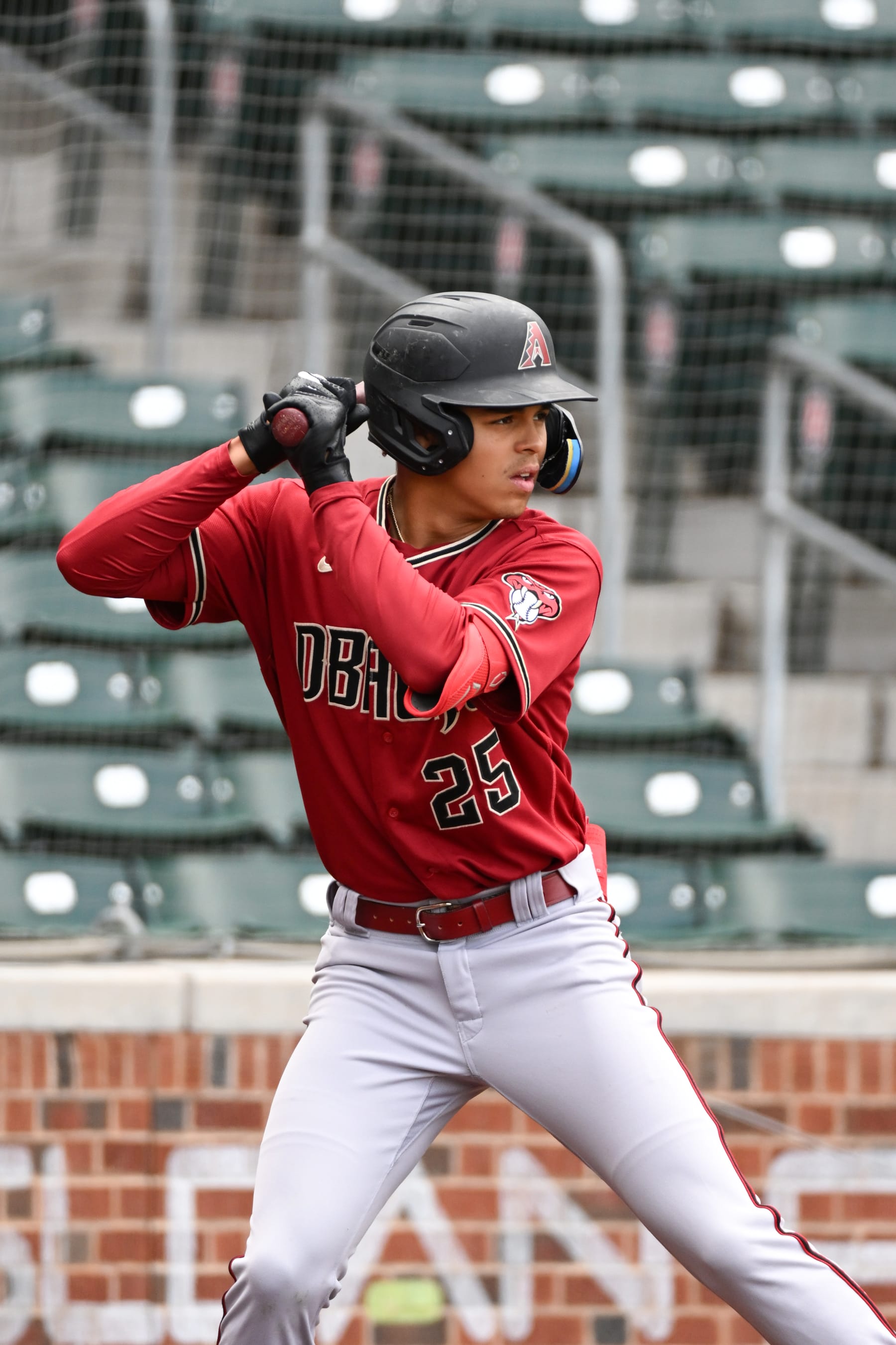 MESA, ARIZONA - MARCH 22, 2023: Druw Jones #25 of the Arizona Diamondbacks prepares to bat during a minor league spring training game against the Chicago Cubs at Sloan Park on March 22, 2023 in Mesa, Arizona. (Photo by David Durochik/Diamond Images via Getty Images)