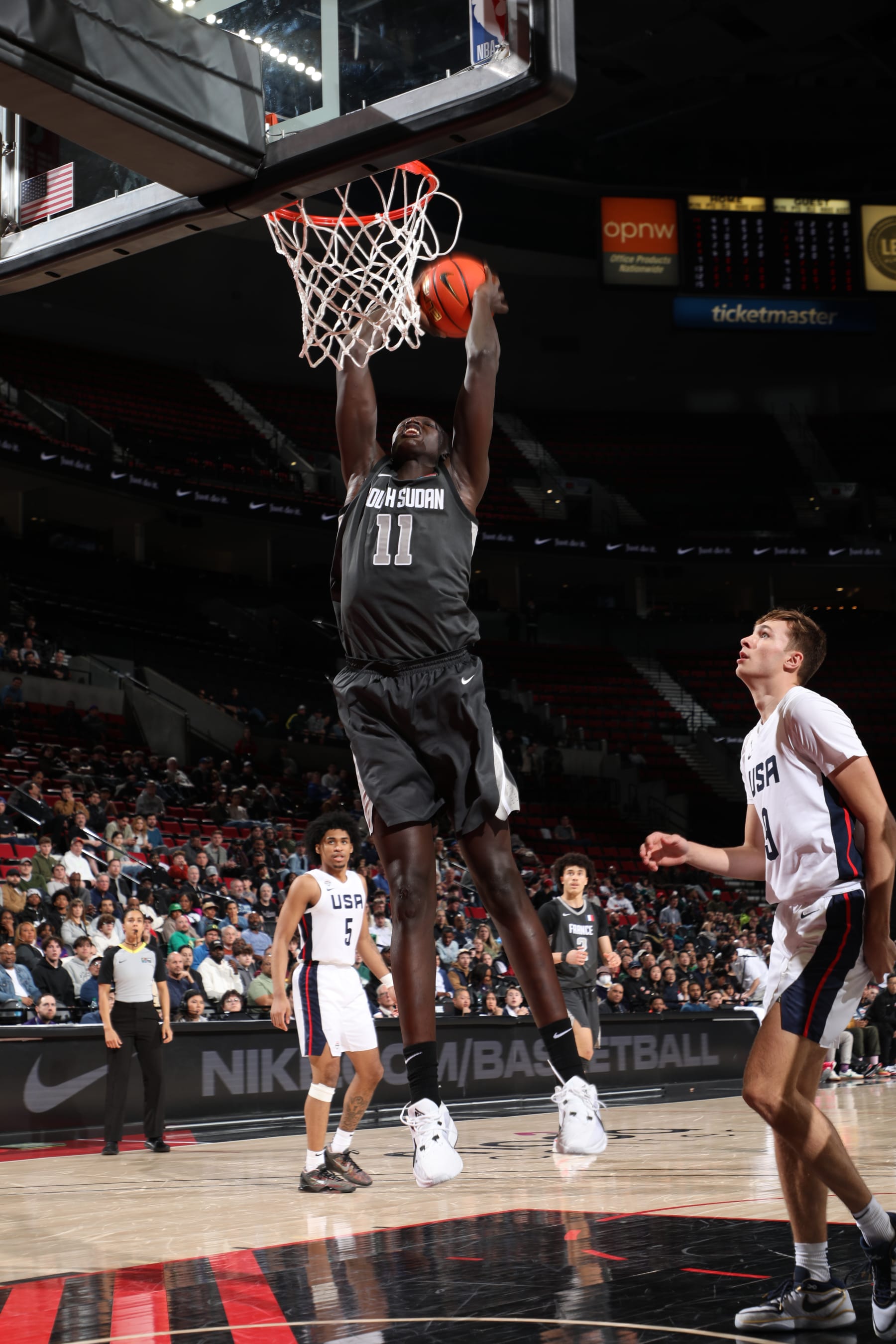PORTLAND, OR - APRIL 13: Khaman Maluach #11 of Team World dunks the ball during the game against Team USA during the 2024 Nike Hoop Summit on April 13, 2024 at the Moda Center Arena in Portland, Oregon. NOTE TO USER: User expressly acknowledges and agrees that, by downloading and or using this photograph, user is consenting to the terms and conditions of the Getty Images License Agreement. Mandatory Copyright Notice: Copyright 2024 NBAE (Photo by Cameron Browne/NBAE via Getty Images)