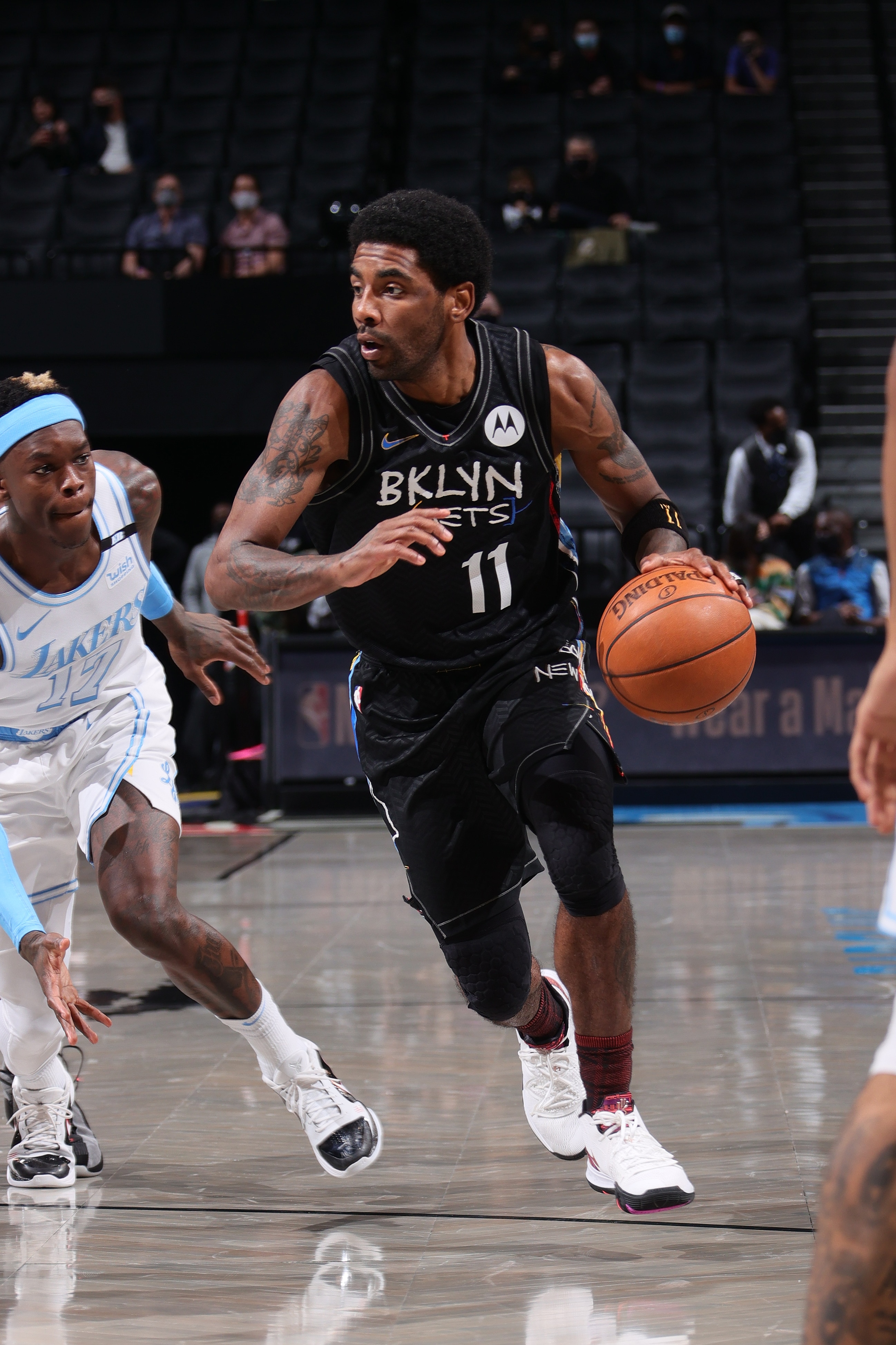 BROOKLYN, NY - APRIL 10: Kyrie Irving #11 of the Brooklyn Nets dribbles the ball during the game against the Los Angeles Lakers on April 10, 2021 at Barclays Center in Brooklyn, New York. NOTE TO USER: User expressly acknowledges and agrees that, by downloading and or using this Photograph, user is consenting to the terms and conditions of the Getty Images License Agreement. Mandatory Copyright Notice: Copyright 2021 NBAE (Photo by Nathaniel S. Butler/NBAE via Getty Images)