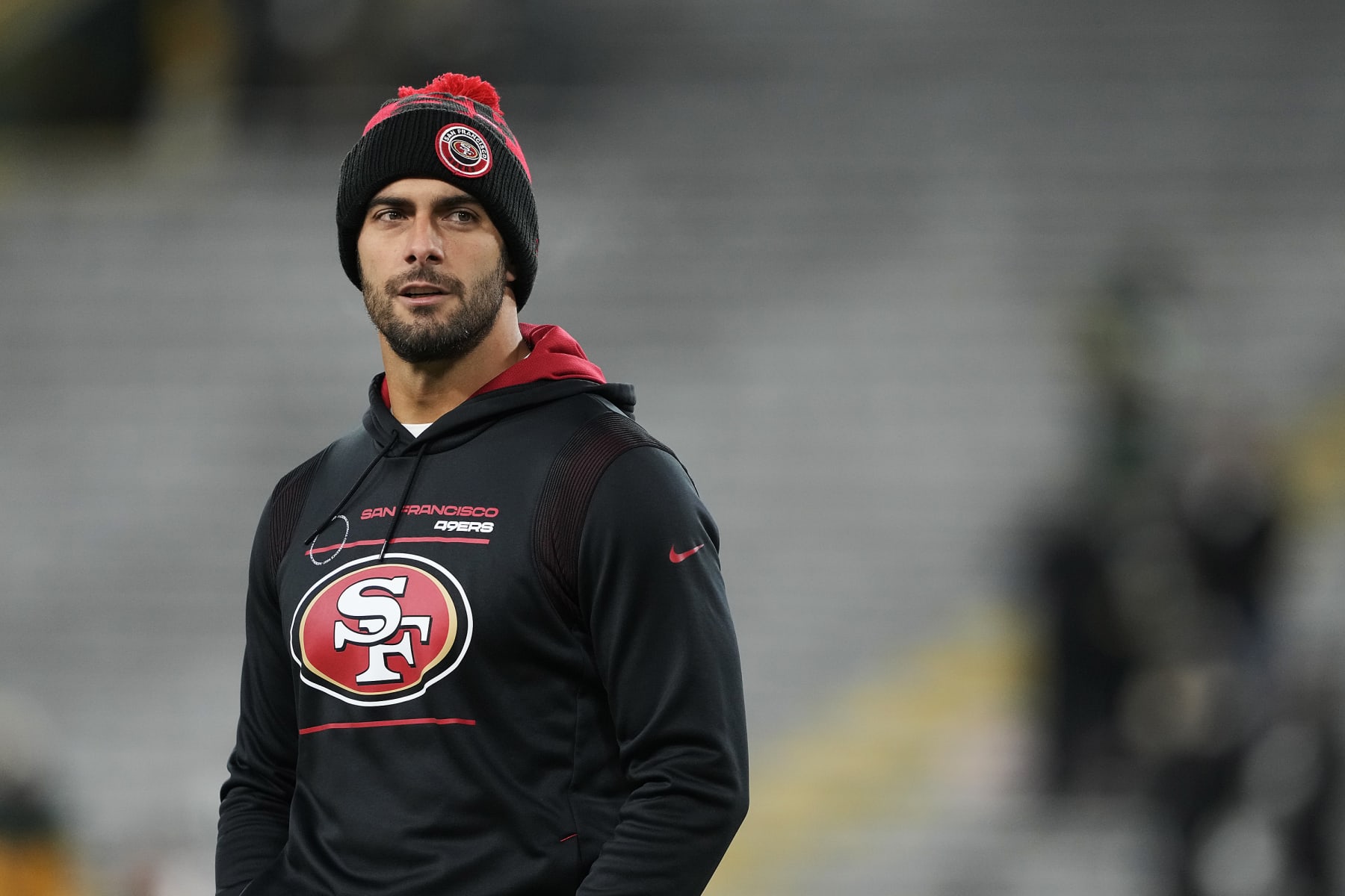 GREEN BAY, WISCONSIN - JANUARY 22:  Quarterback Jimmy Garoppolo #10 of the San Francisco 49ers warms up prior to the  NFC Divisional Playoff game against the Green Bay Packers at Lambeau Field on January 22, 2022 in Green Bay, Wisconsin. (Photo by Patrick McDermott/Getty Images)
